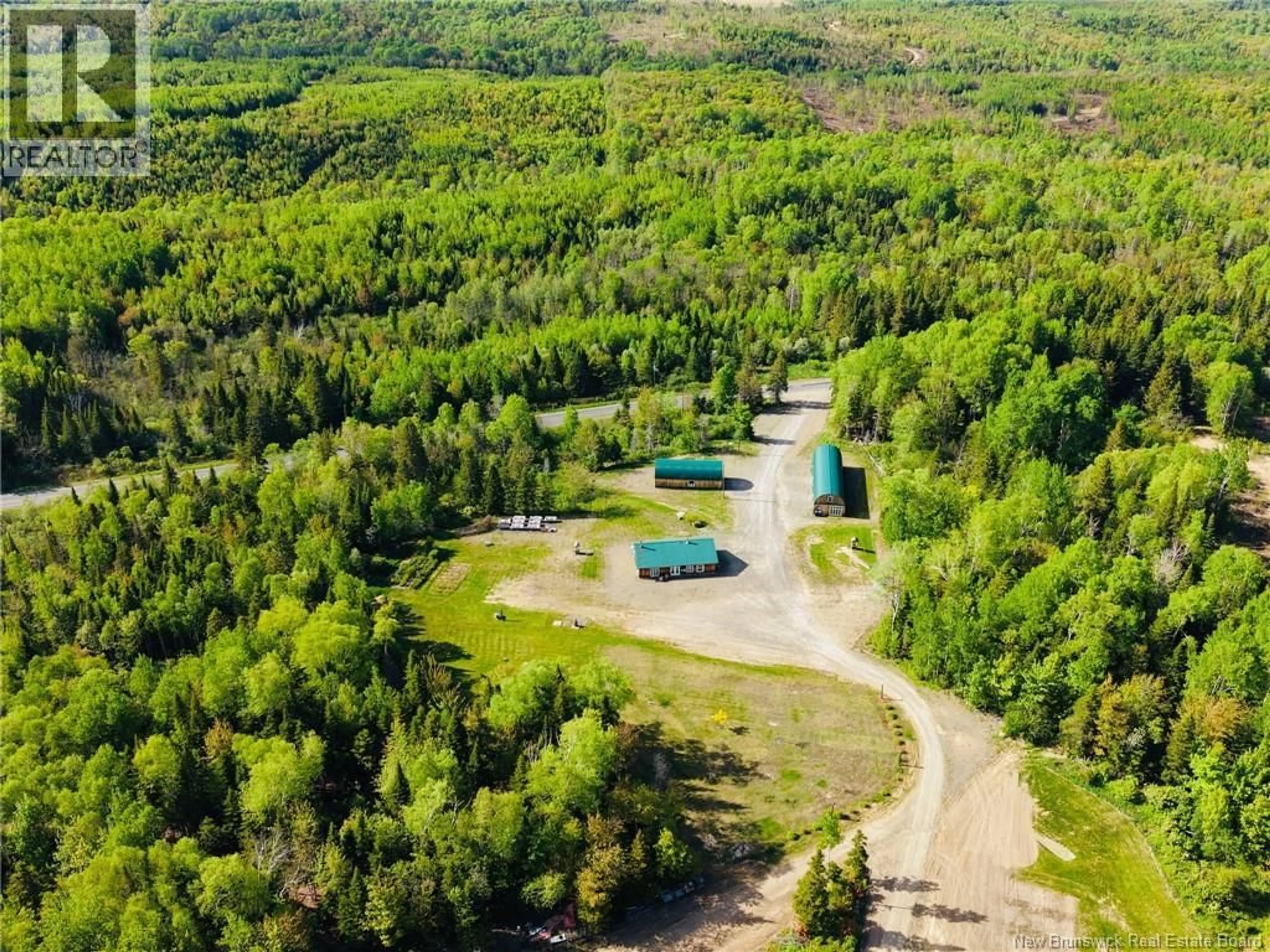 A pic from outside/outdoor area/front of a property/back of a property/a pic from drone, forest/trees view for 933 ST-MAURE ROAD, Saint-Maure New Brunswick E8E1M6