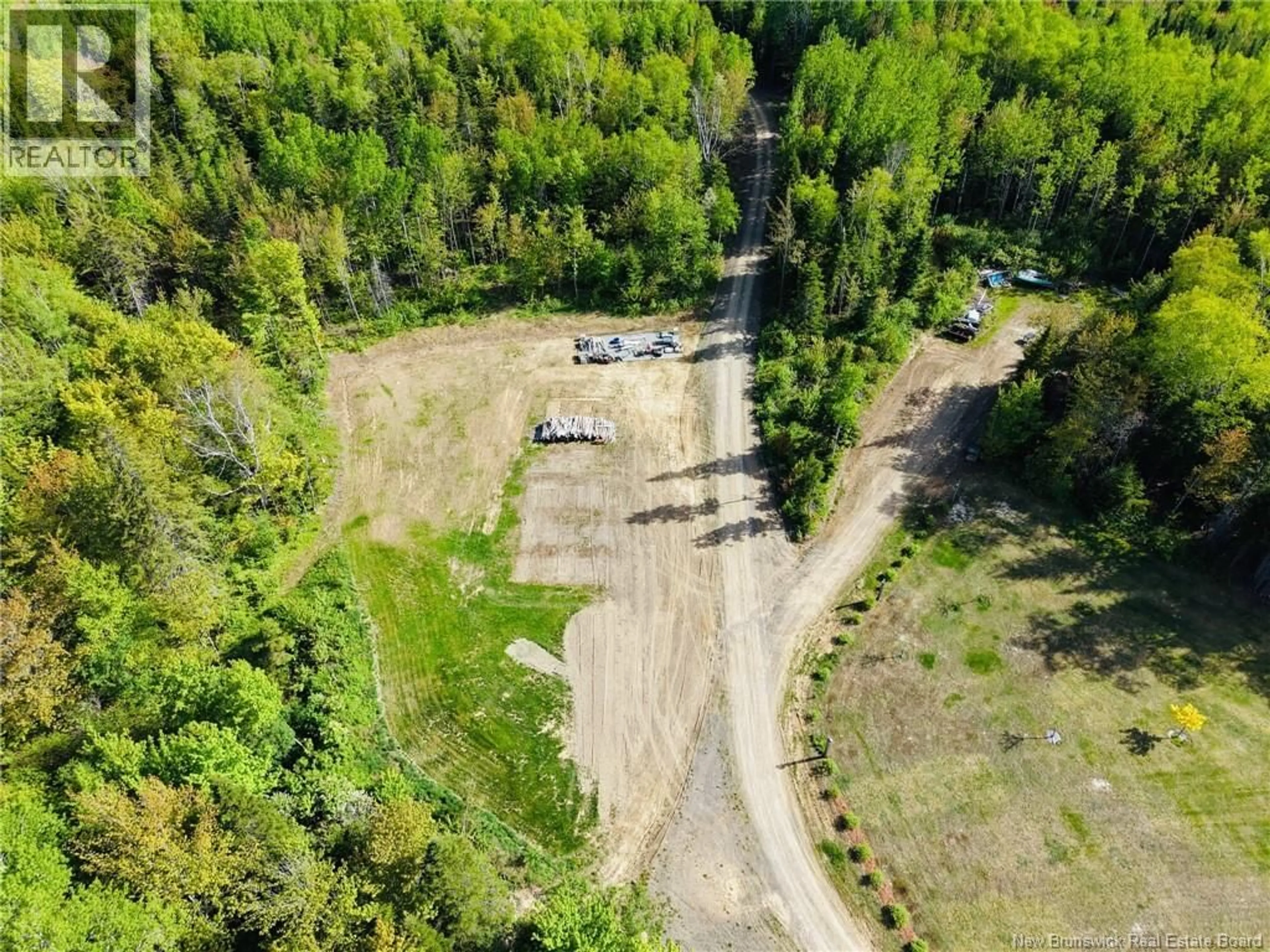 A pic from outside/outdoor area/front of a property/back of a property/a pic from drone, forest/trees view for 933 ST-MAURE ROAD, Saint-Maure New Brunswick E8E1M6