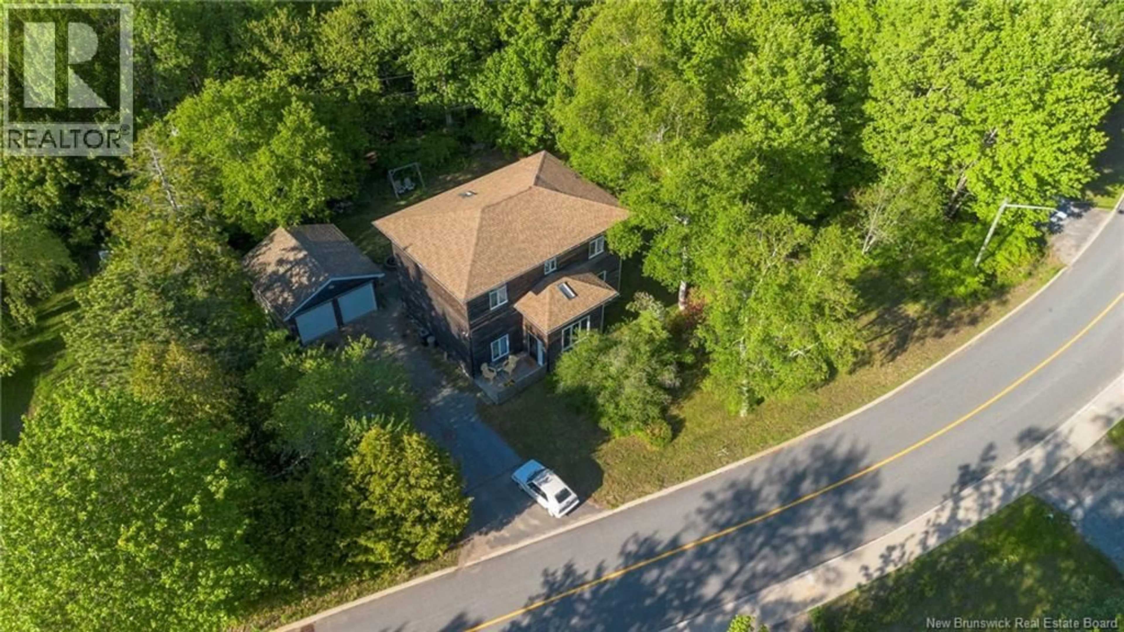 A pic from outside/outdoor area/front of a property/back of a property/a pic from drone, street for 13 IONA AVENUE, Rothesay New Brunswick E2E3H6