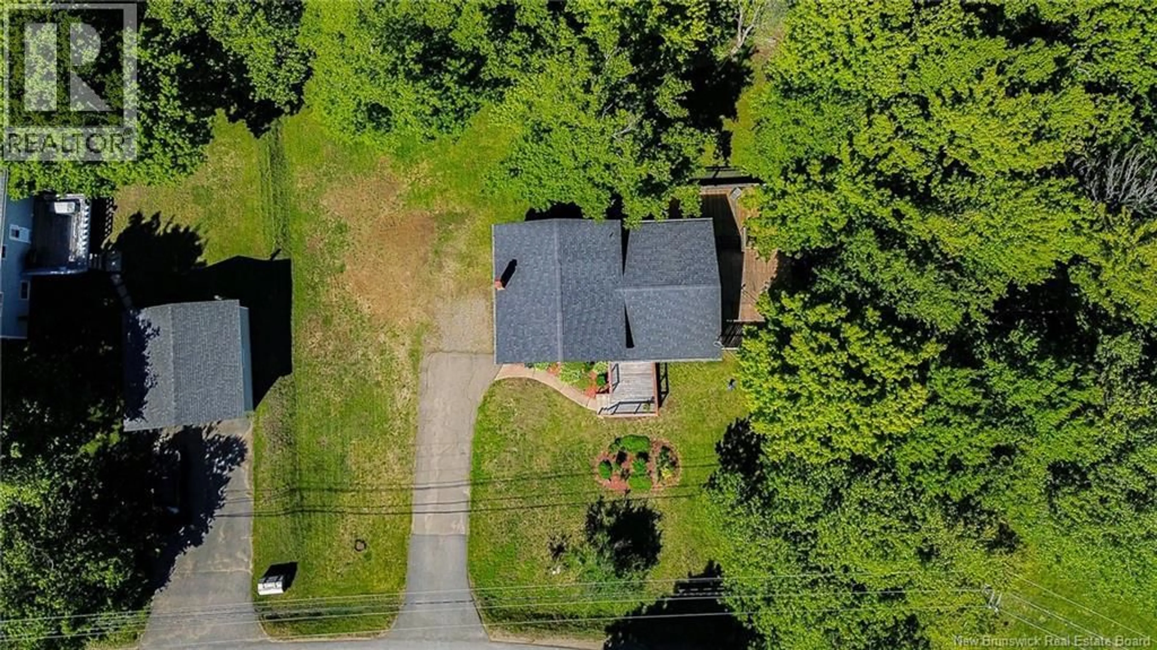 A pic from outside/outdoor area/front of a property/back of a property/a pic from drone, unknown for 7 DOFRED ROAD, Rothesay New Brunswick E2S1A6