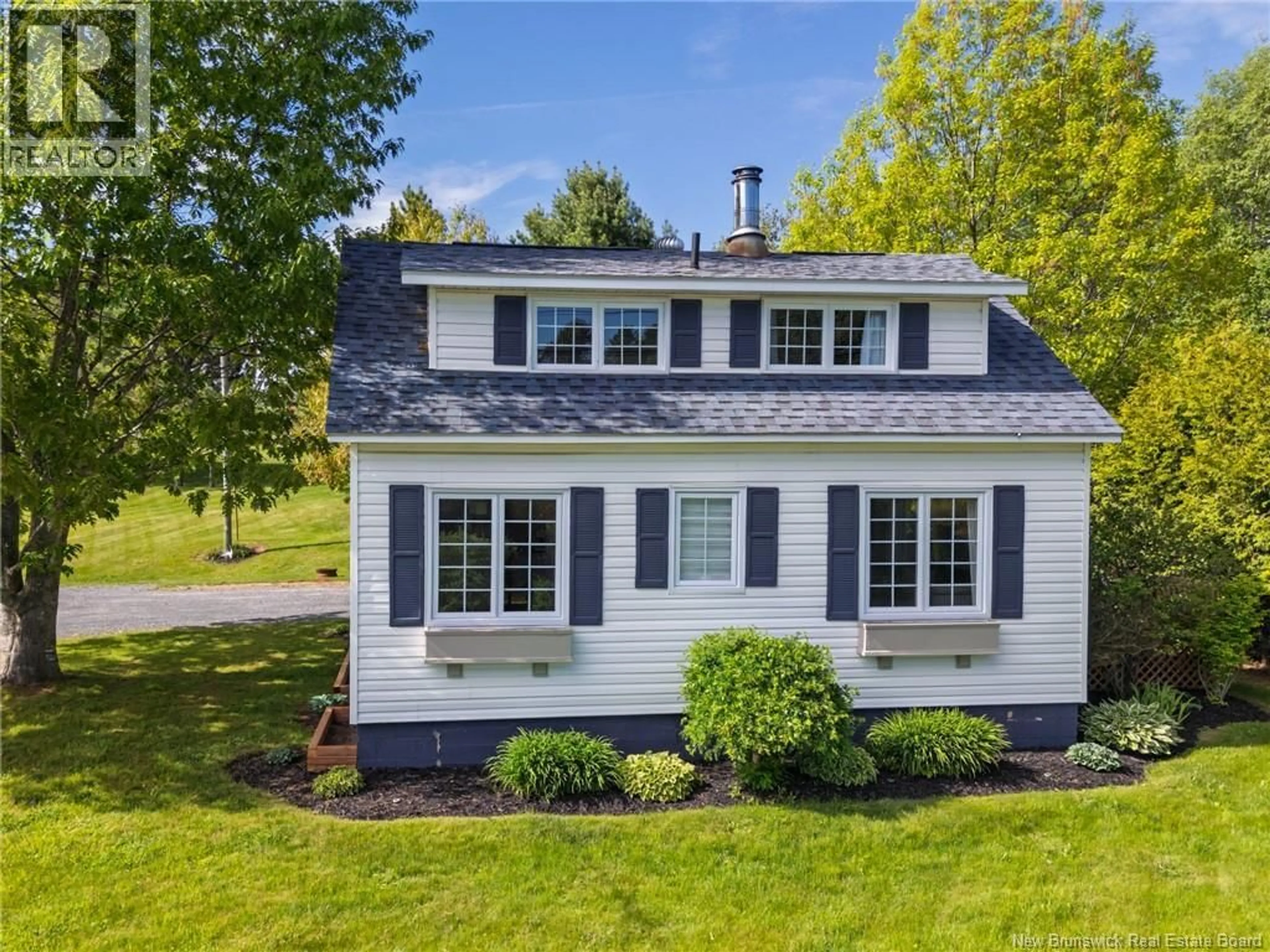 Home with vinyl exterior material, street for 79 MAIN STREET, Linton Corner New Brunswick E7G2H3