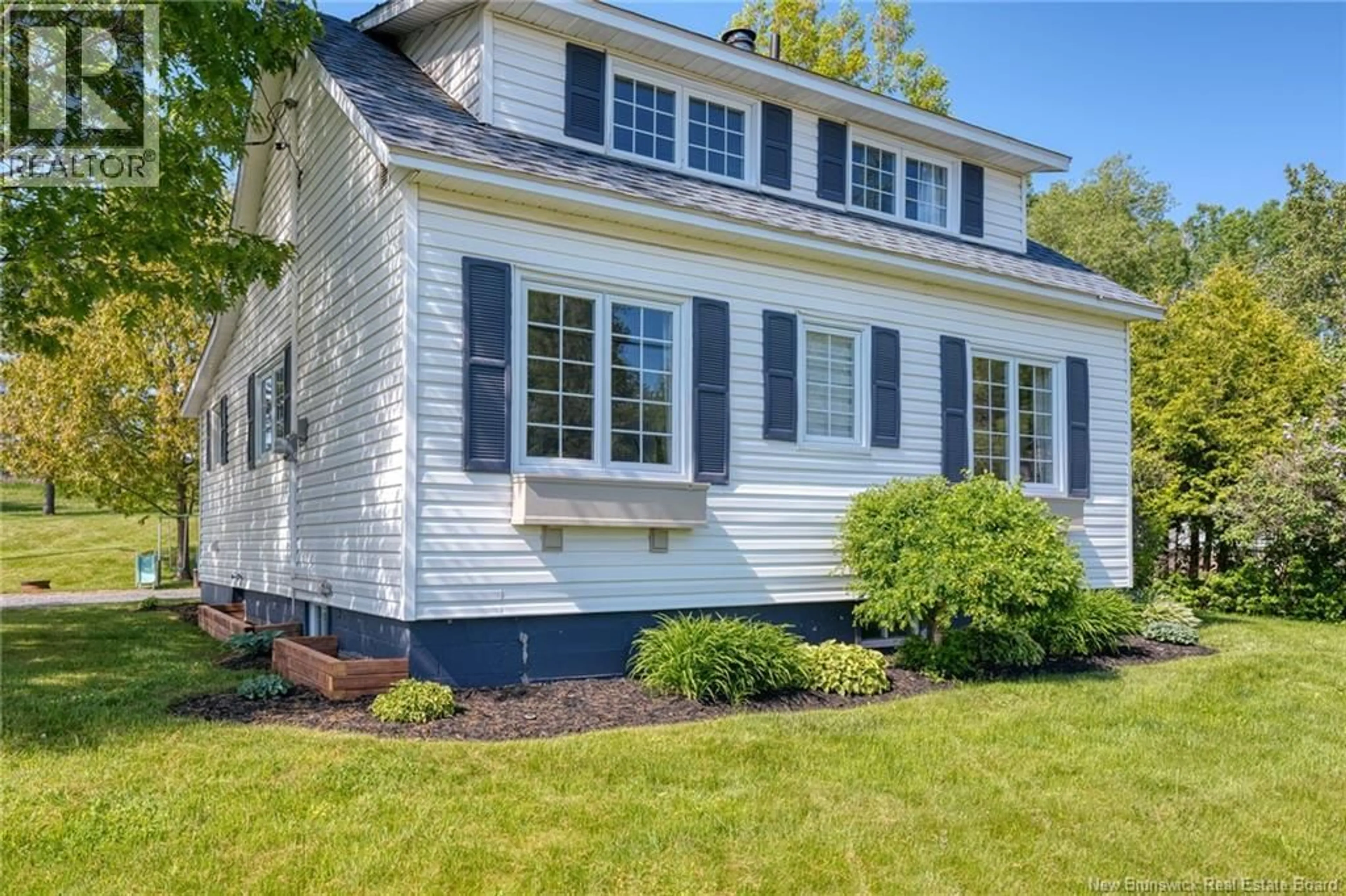 Home with vinyl exterior material, street for 79 MAIN STREET, Linton Corner New Brunswick E7G2H3