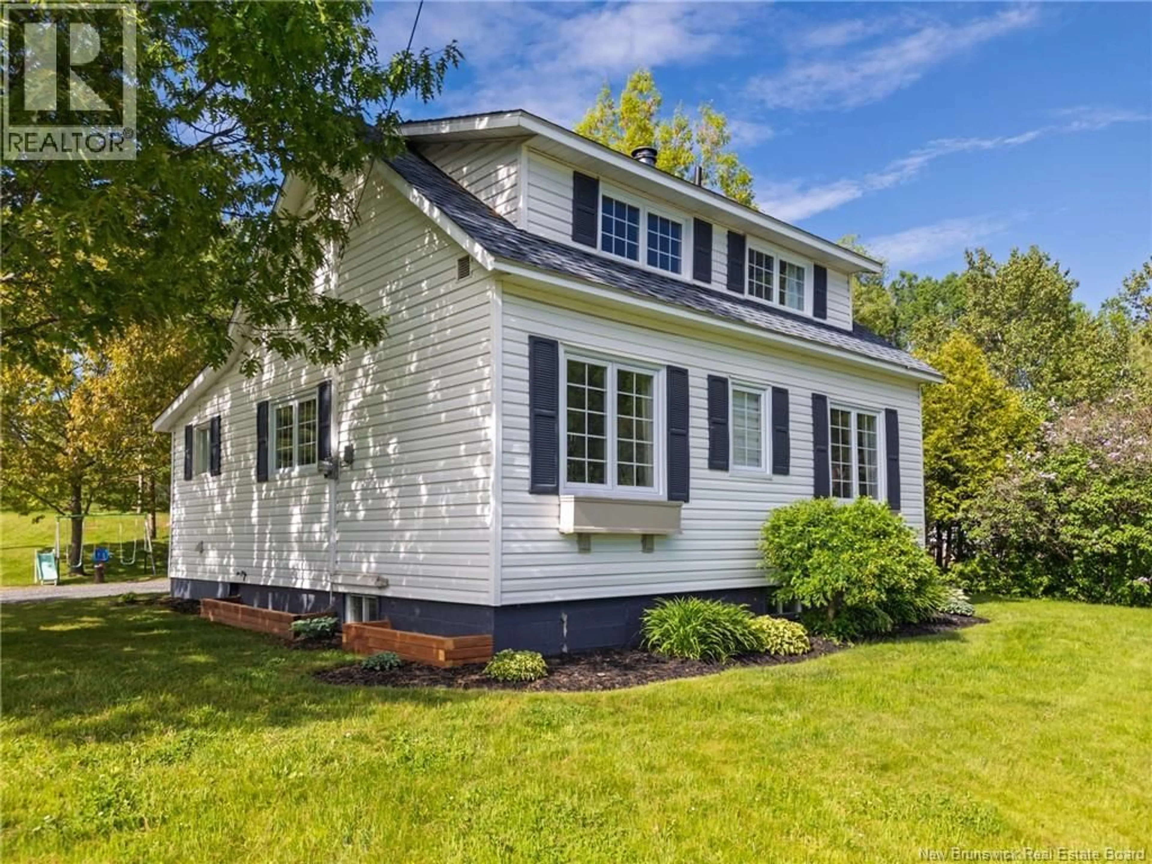 Home with vinyl exterior material, street for 79 MAIN STREET, Linton Corner New Brunswick E7G2H3