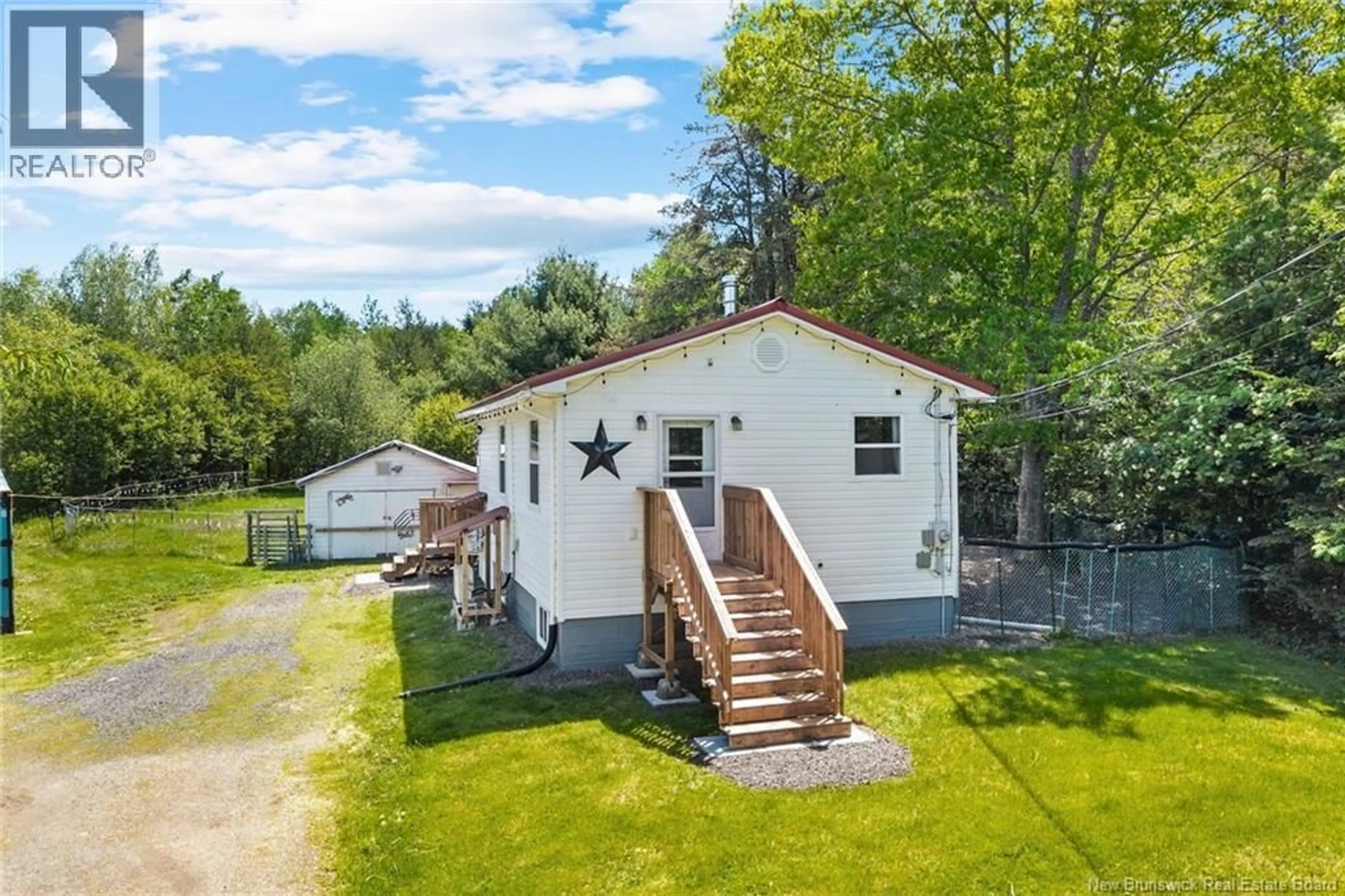 A pic from outside/outdoor area/front of a property/back of a property/a pic from drone, street for 90 QUEEN STREET, Chipman New Brunswick E4A2K2