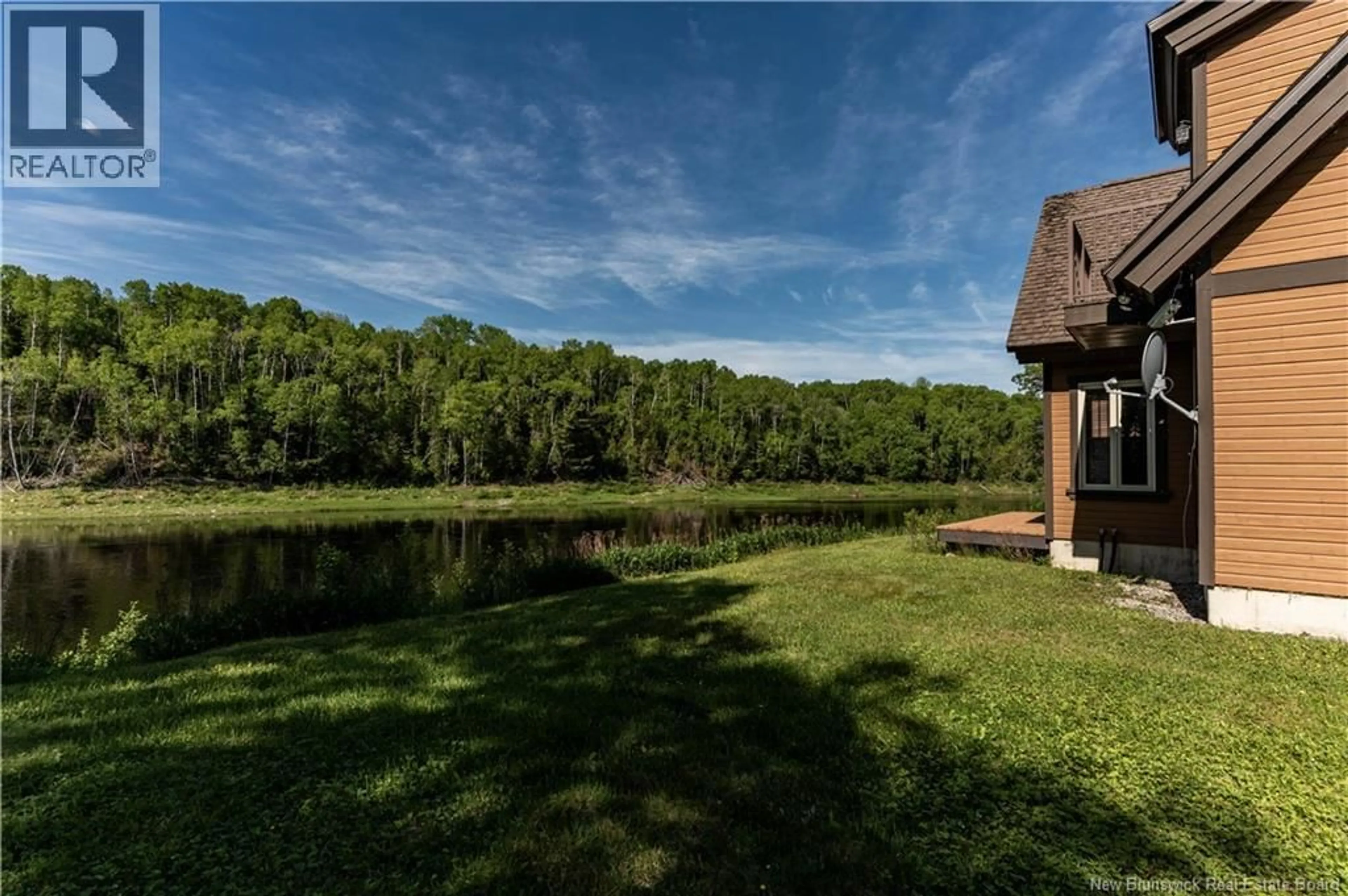 A pic from outside/outdoor area/front of a property/back of a property/a pic from drone, water/lake/river/ocean view for 1247 HWY 118, Gray Rapids New Brunswick E9B1B5