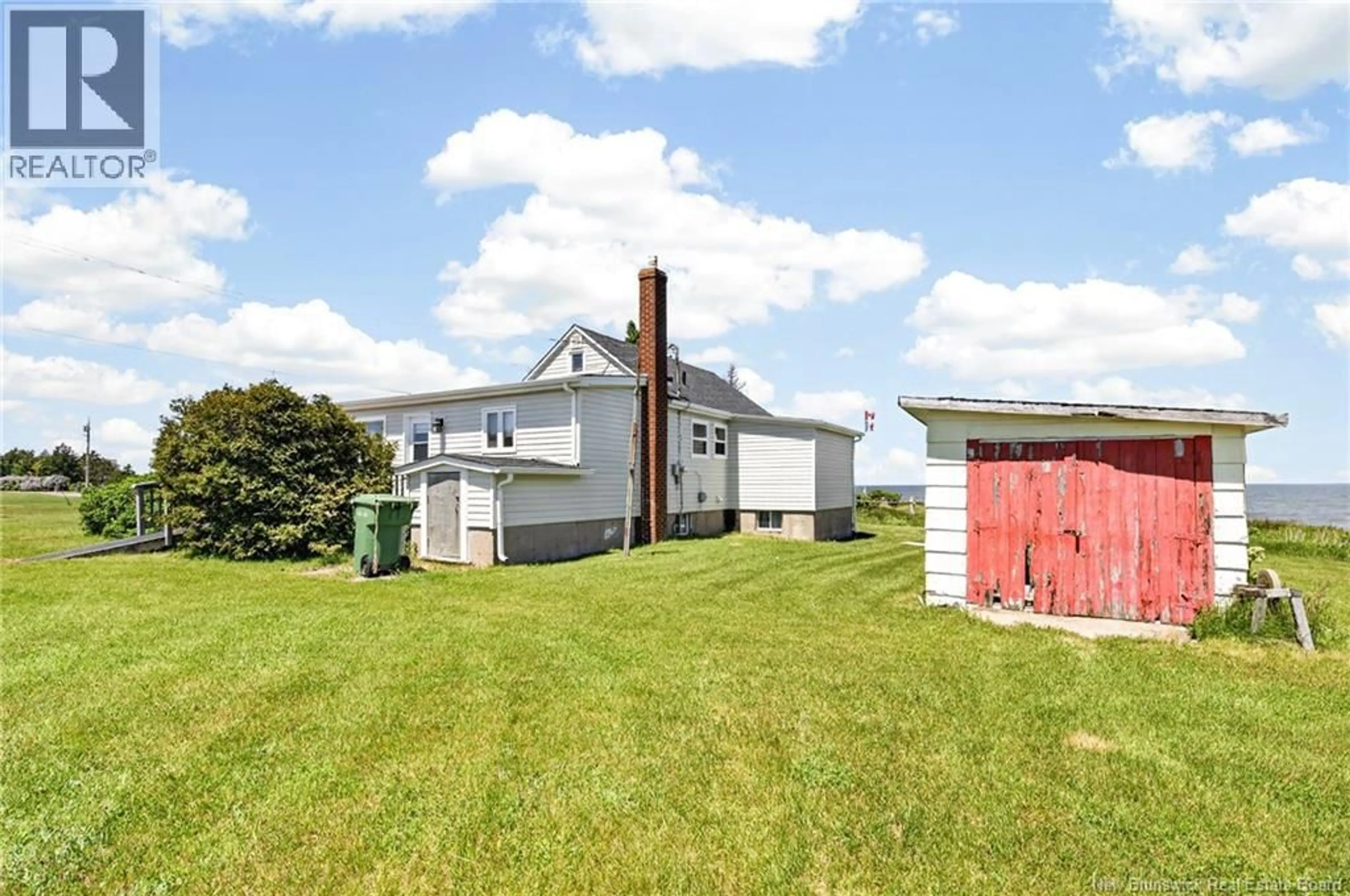 A pic from outside/outdoor area/front of a property/back of a property/a pic from drone, unknown for 39 ALLEE DES COLIBRIS, Bas Cap Pele New Brunswick E4N1L1