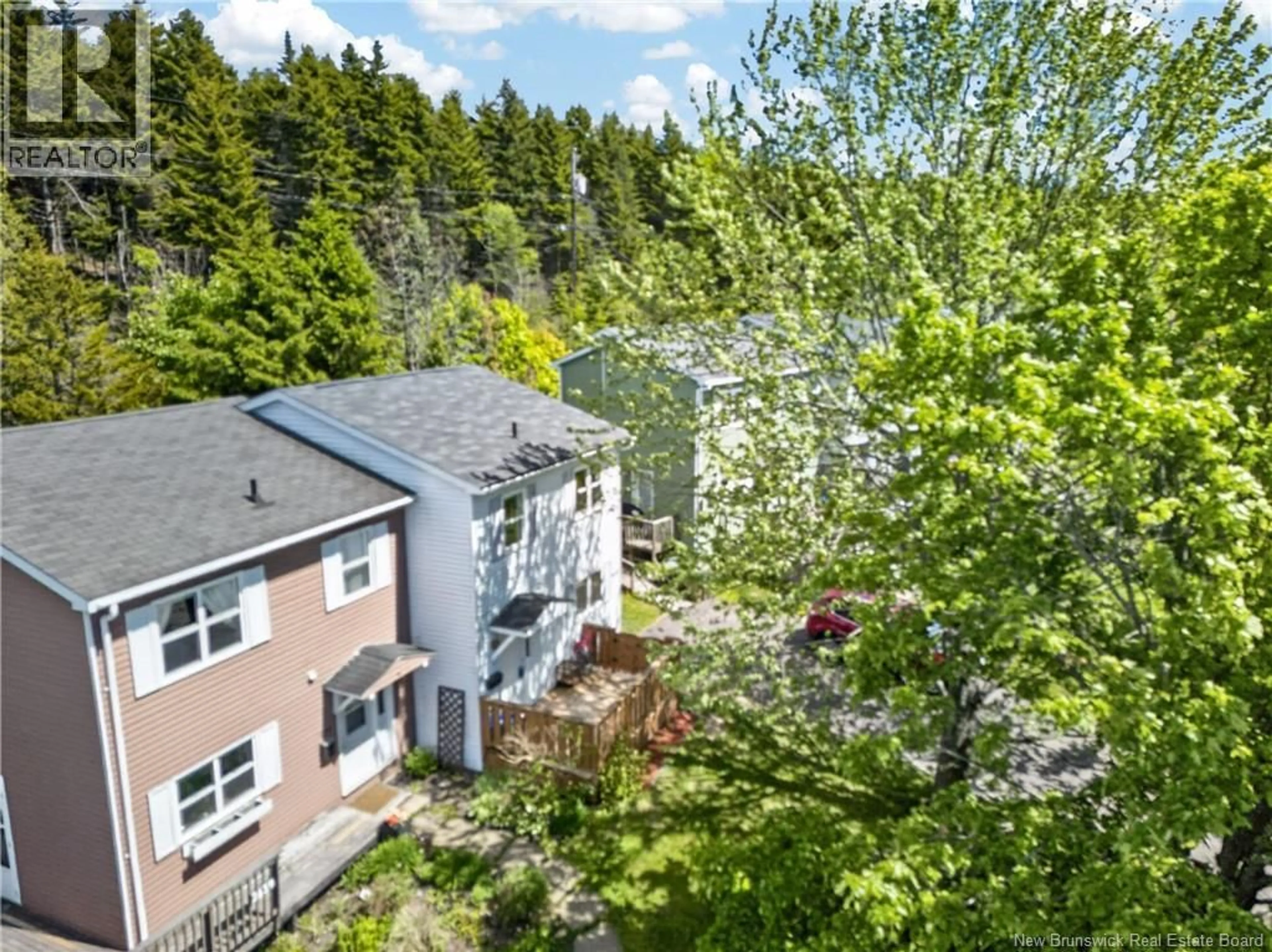 A pic from outside/outdoor area/front of a property/back of a property/a pic from drone, forest/trees view for 2437 CANDACE STREET, Saint John New Brunswick E2J2Z8