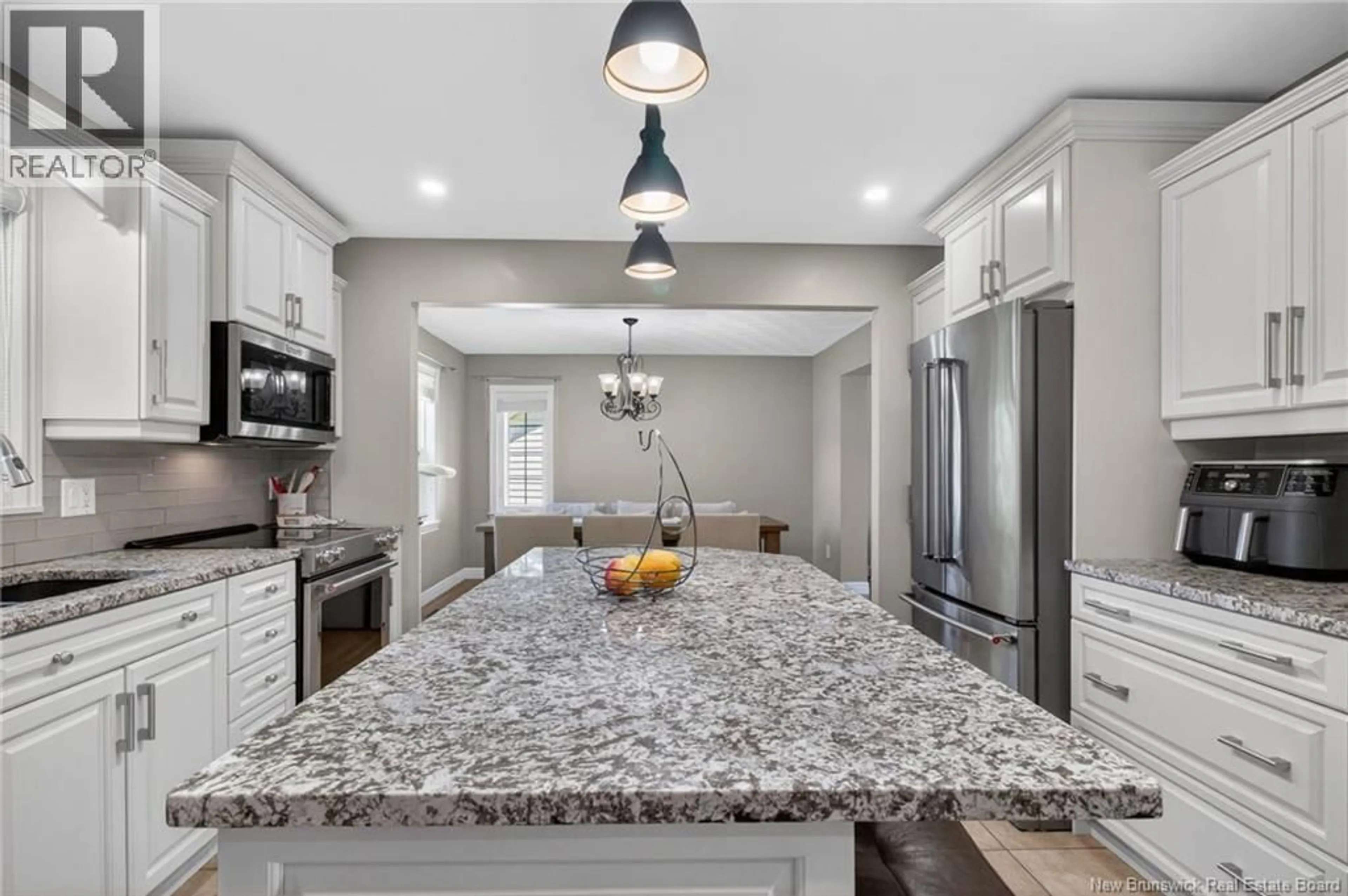Open concept kitchen, ceramic/tile floor for 73 TEAKWOOD WAY, Moncton New Brunswick E1G1T3