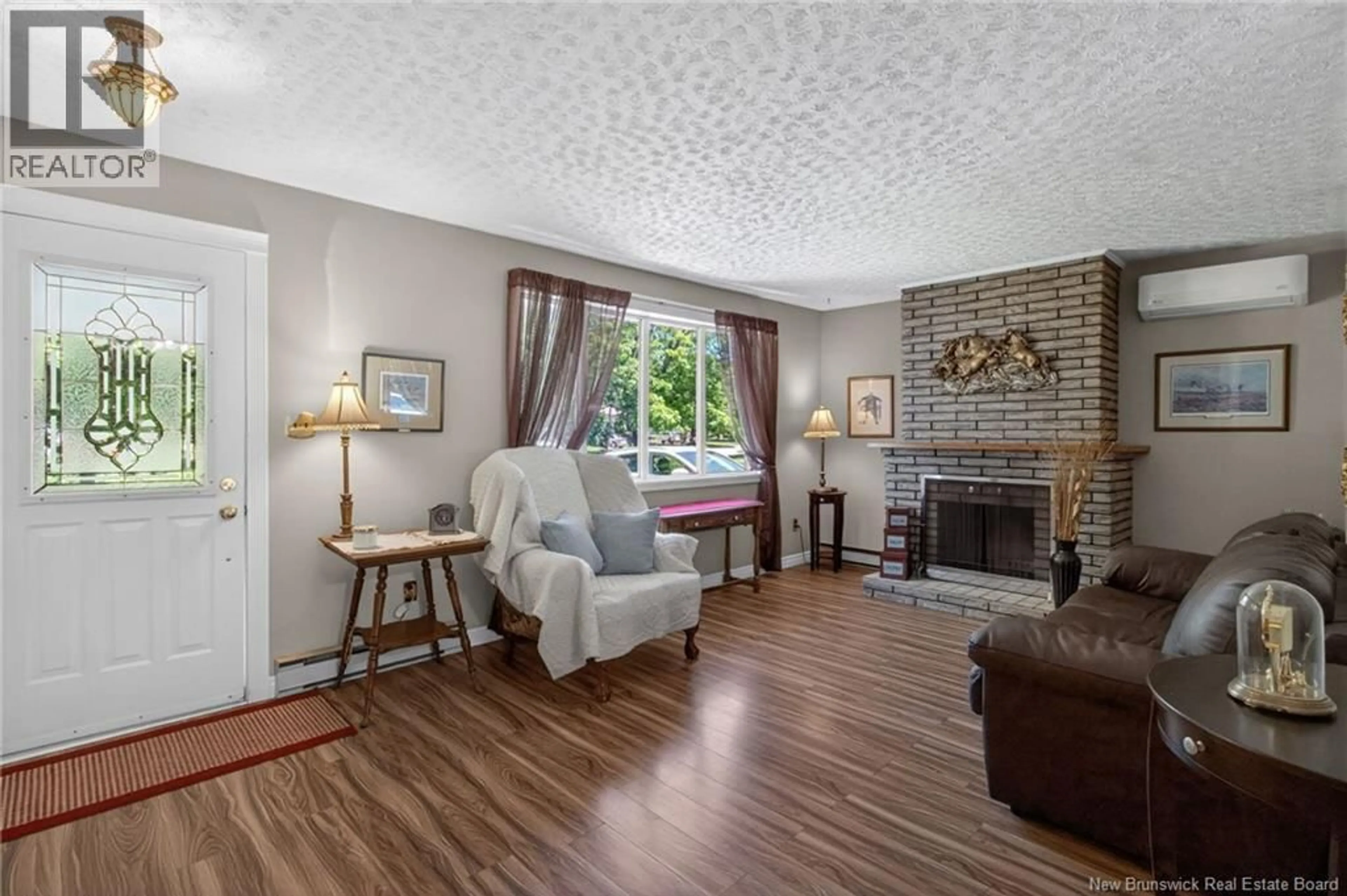 Living room with furniture, wood/laminate floor for 4 WARREN AVENUE, Riverview New Brunswick E1B3M3