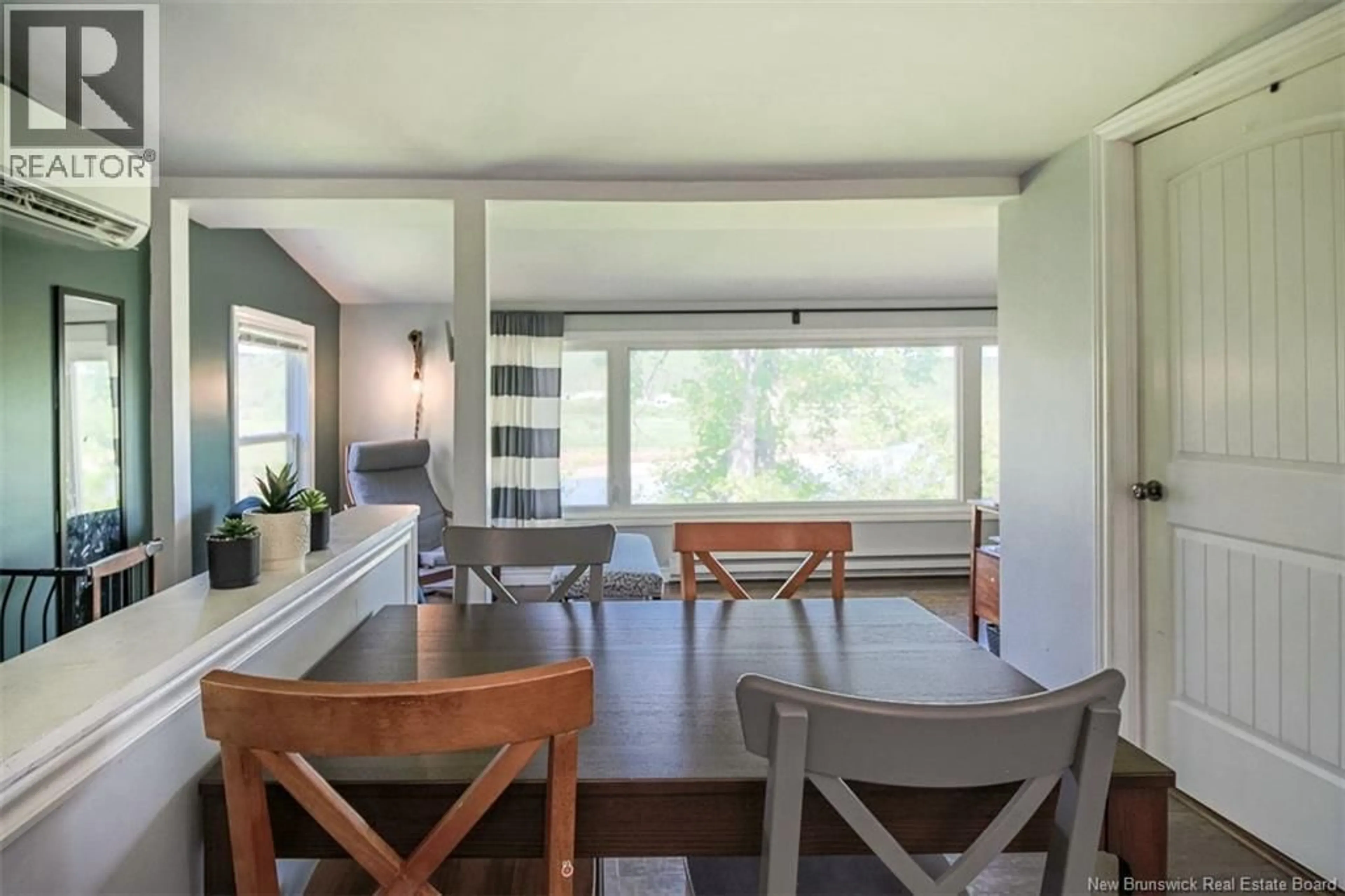 Dining room, wood/laminate floor for 82 PORTER ROAD, Nauwigewauk New Brunswick E5N6X2