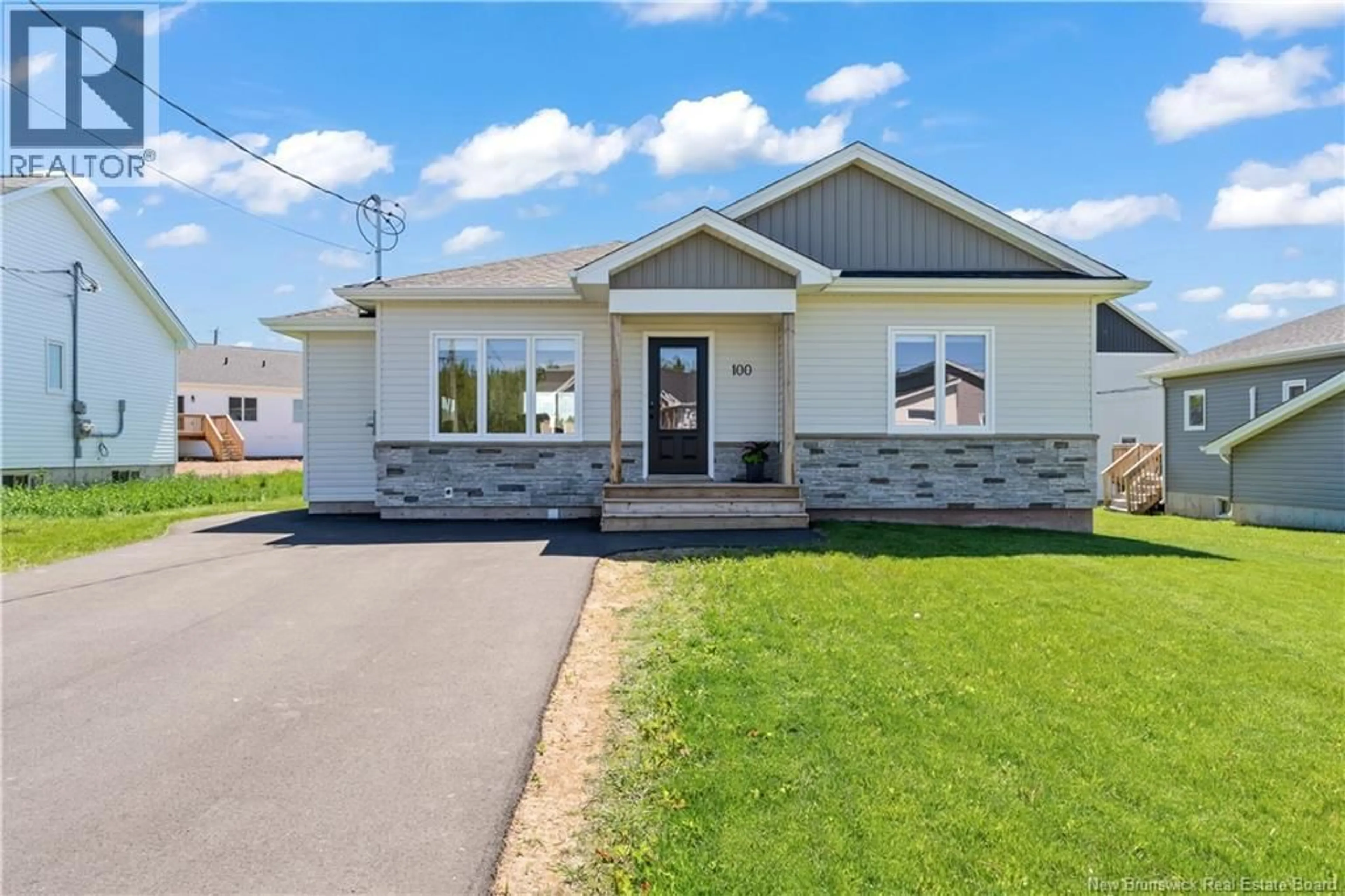 Home with vinyl exterior material, street for 100 MACINTOSH BOULEVARD, Moncton New Brunswick E1K0A1