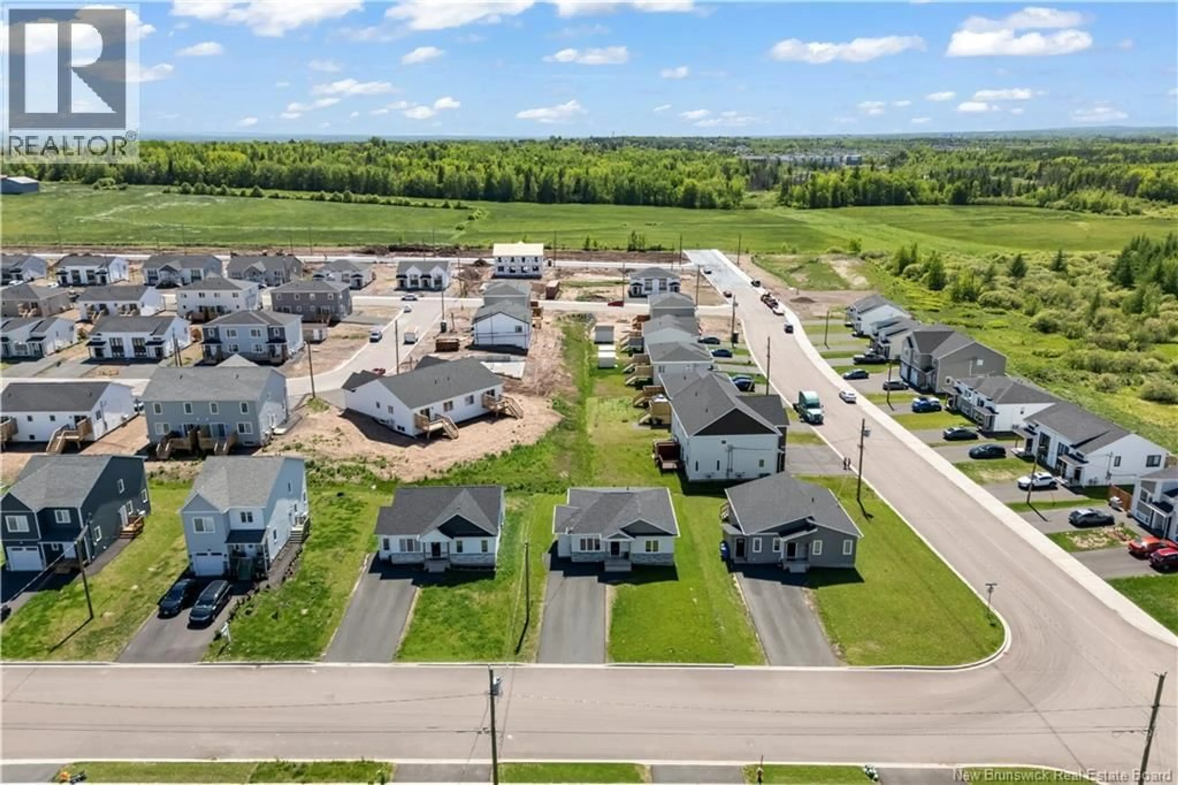 A pic from outside/outdoor area/front of a property/back of a property/a pic from drone, street for 100 MACINTOSH BOULEVARD, Moncton New Brunswick E1K0A1