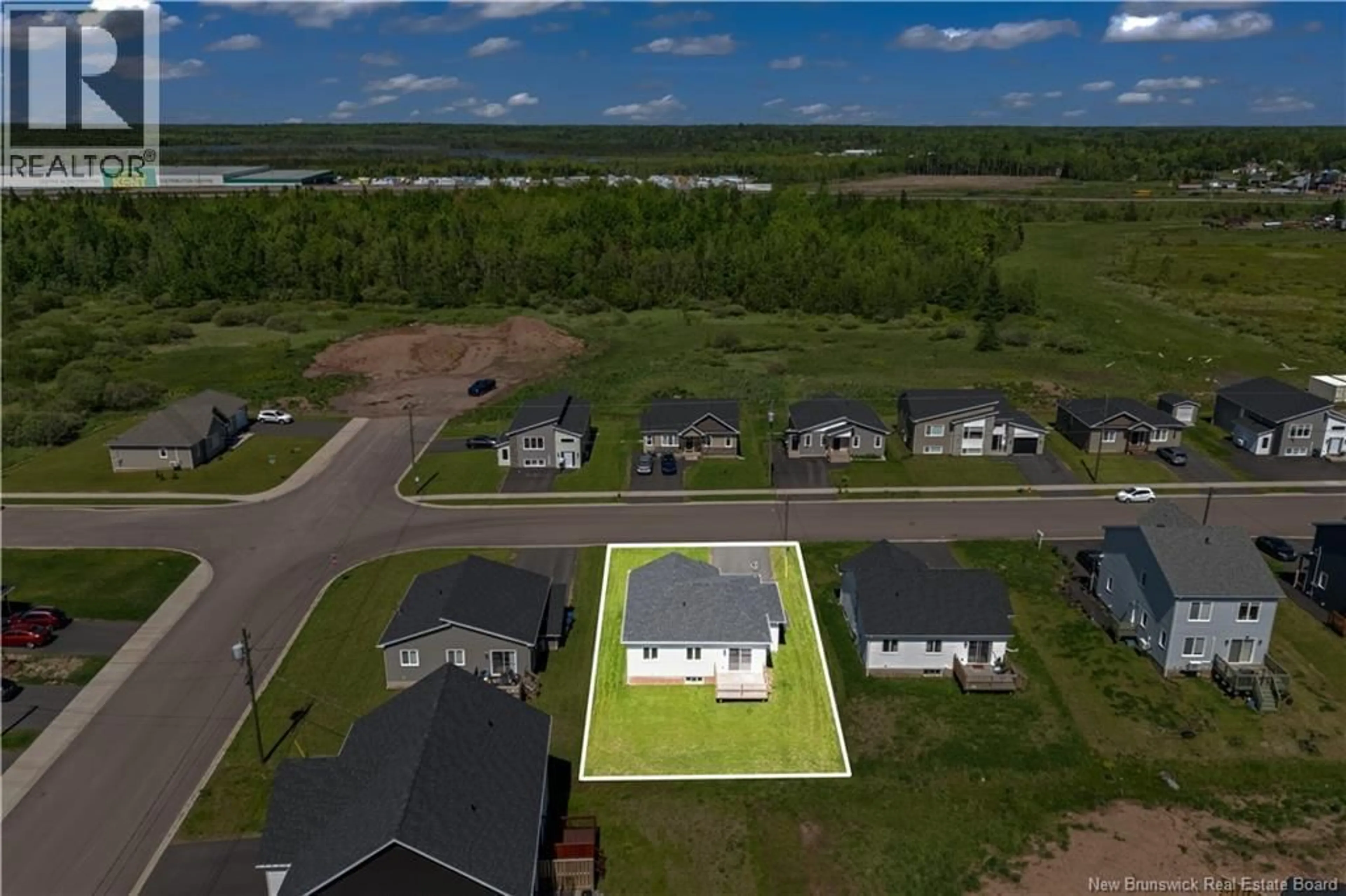 A pic from outside/outdoor area/front of a property/back of a property/a pic from drone, water/lake/river/ocean view for 100 MACINTOSH BOULEVARD, Moncton New Brunswick E1K0A1
