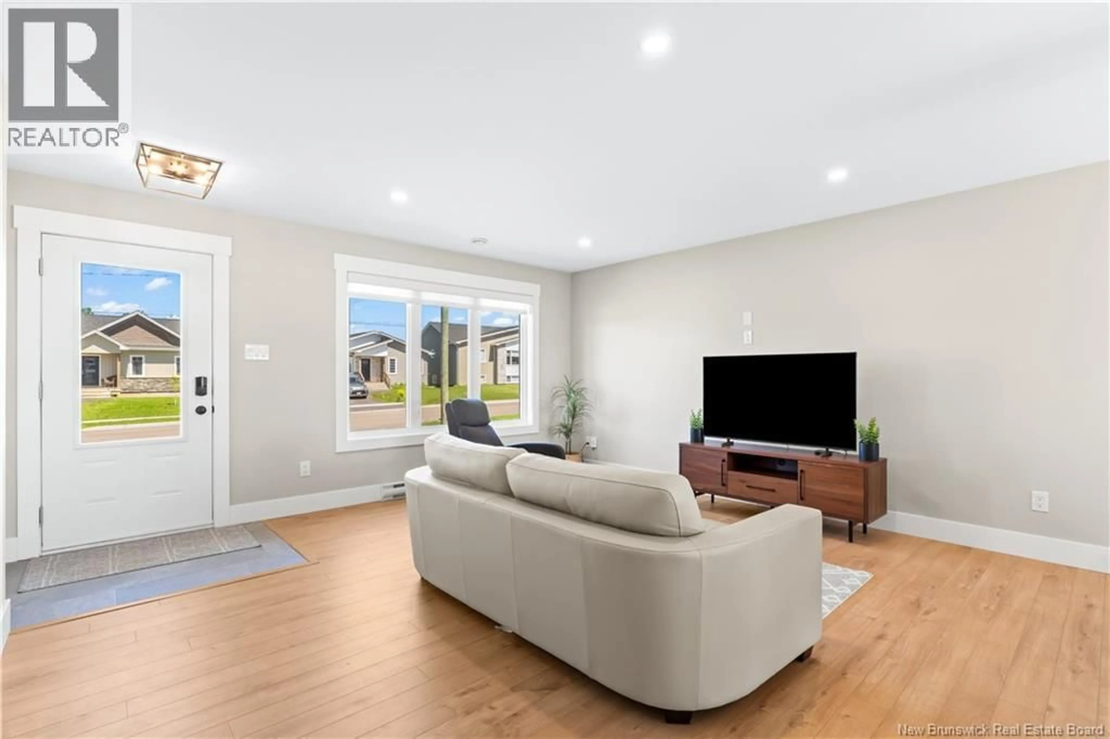 Living room with furniture, unknown for 100 MACINTOSH BOULEVARD, Moncton New Brunswick E1K0A1