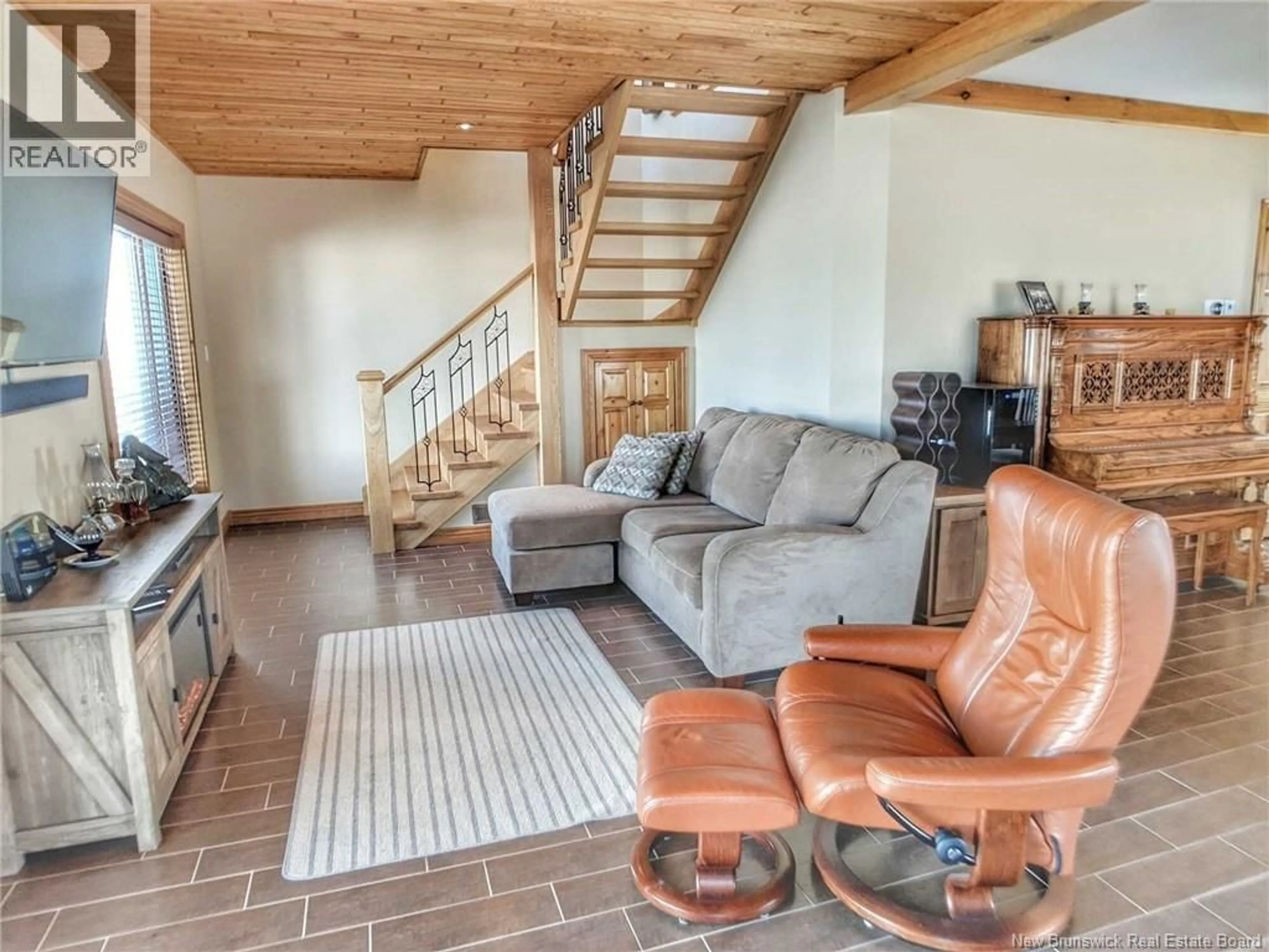 Living room with furniture, unknown for 10 RUE DE LA DUNE, Caraquet New Brunswick E1W1B5