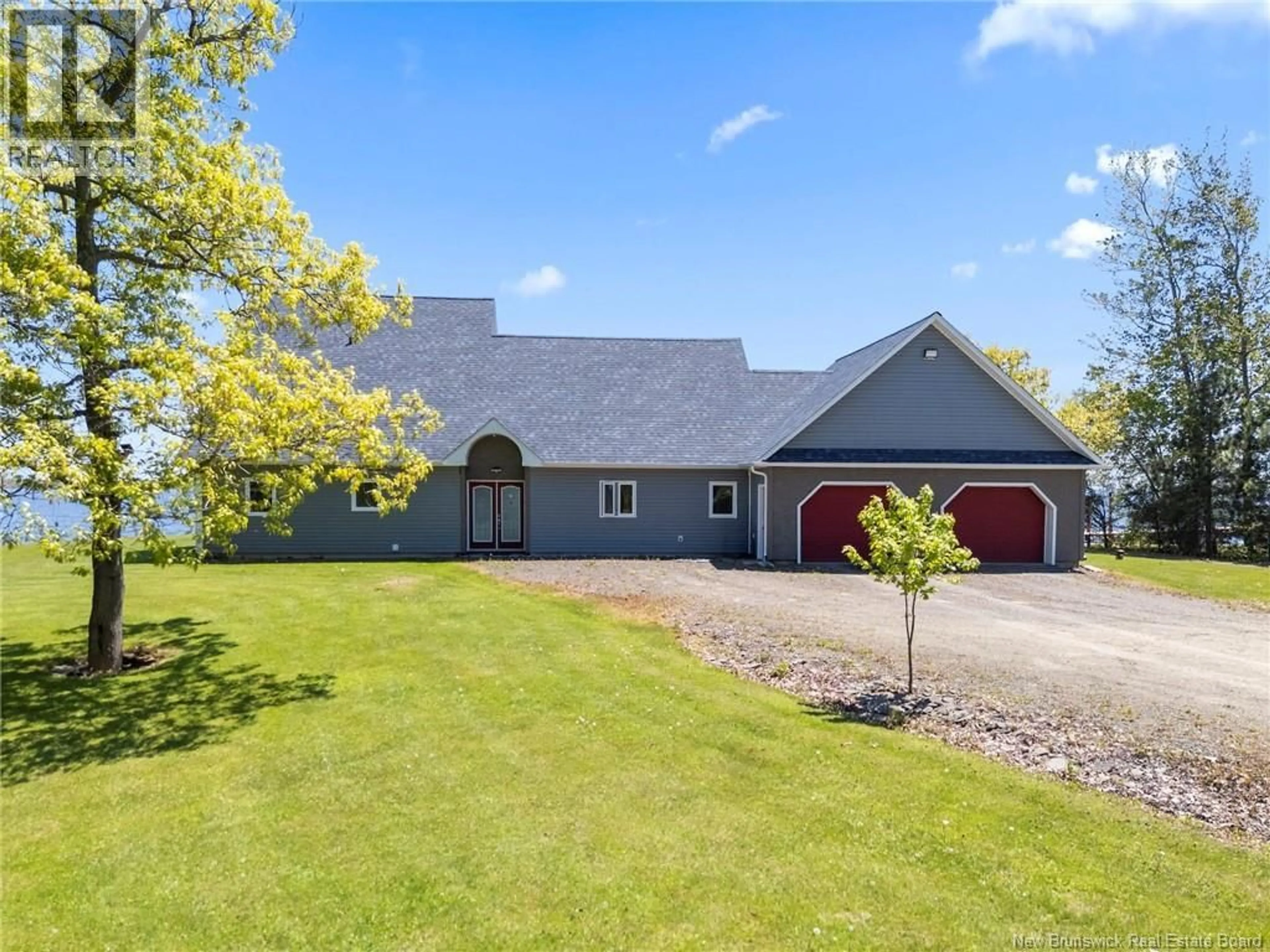 A pic from outside/outdoor area/front of a property/back of a property/a pic from drone, water/lake/river/ocean view for 124 WINTERPORT WAY, Grand Lake New Brunswick E4B4B1