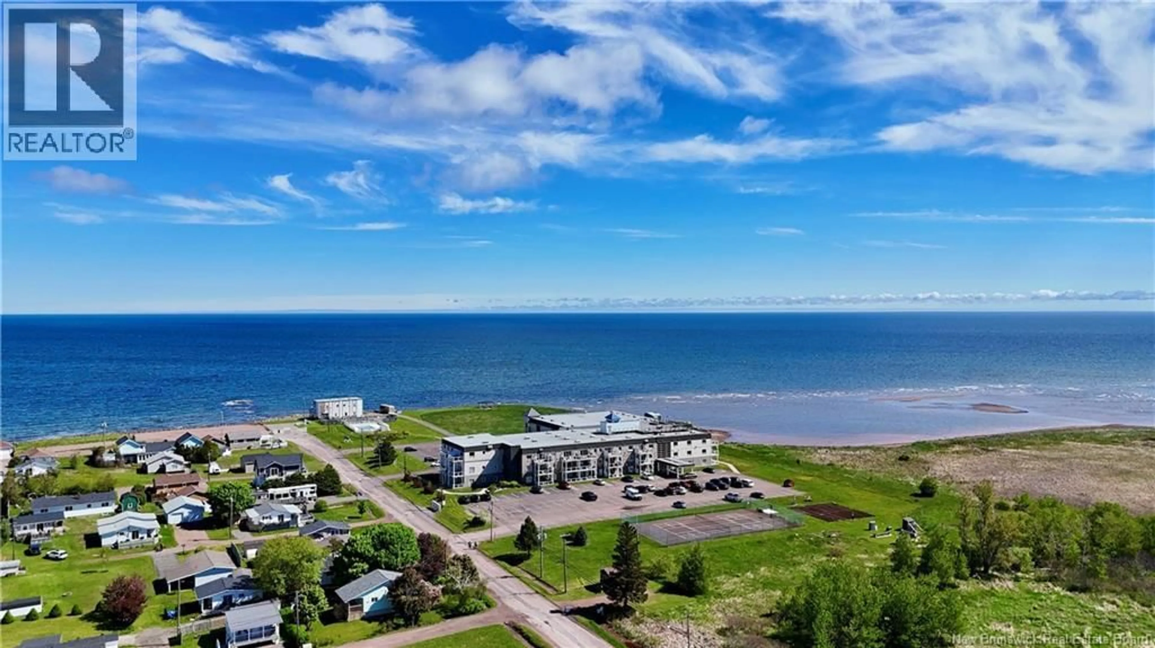 A pic from outside/outdoor area/front of a property/back of a property/a pic from drone, water/lake/river/ocean view for 106 - 69 CAP BIMET BOULEVARD, Grand-Barachois New Brunswick E4P6X5