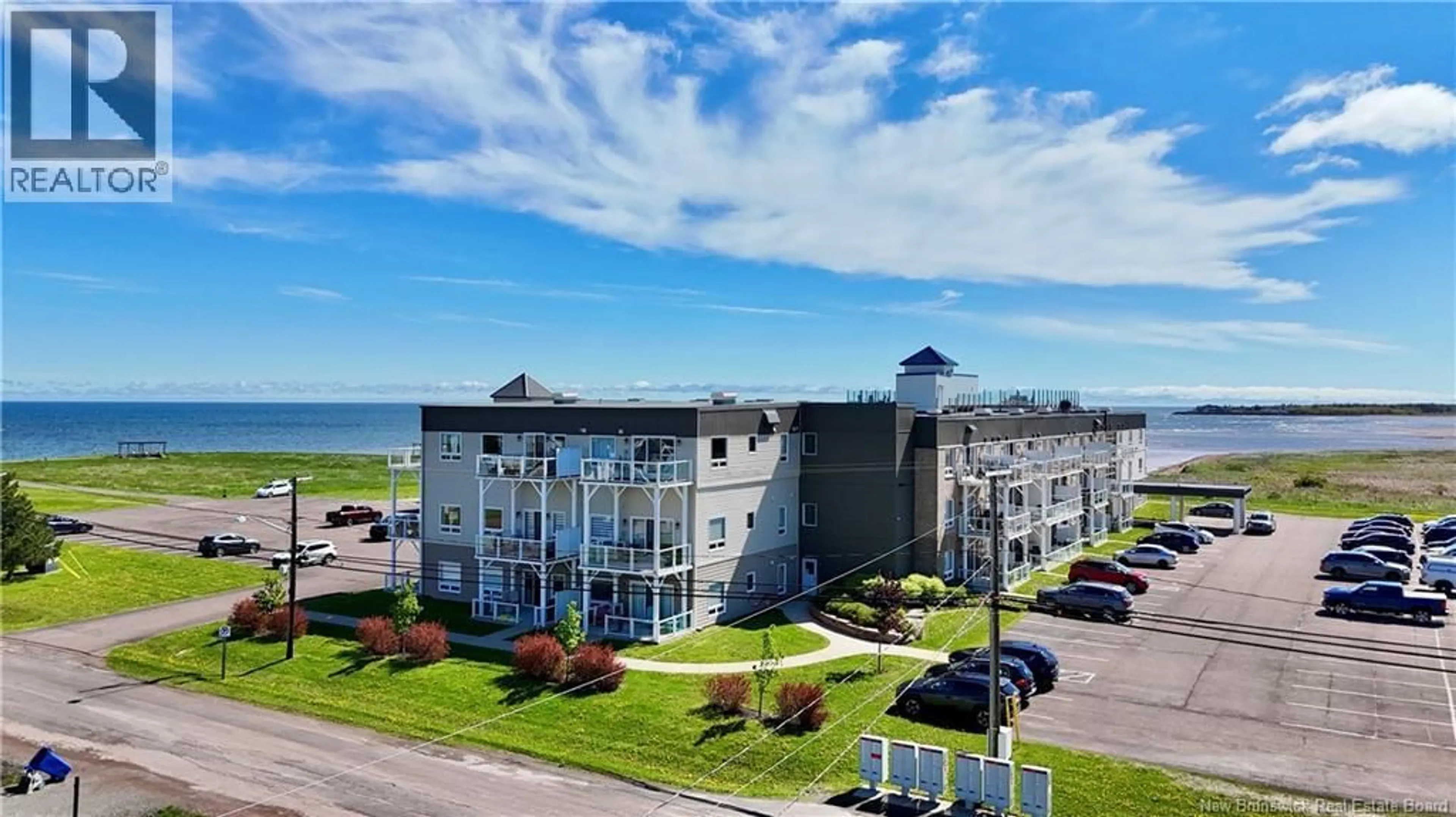 A pic from outside/outdoor area/front of a property/back of a property/a pic from drone, water/lake/river/ocean view for 106 - 69 CAP BIMET BOULEVARD, Grand-Barachois New Brunswick E4P6X5