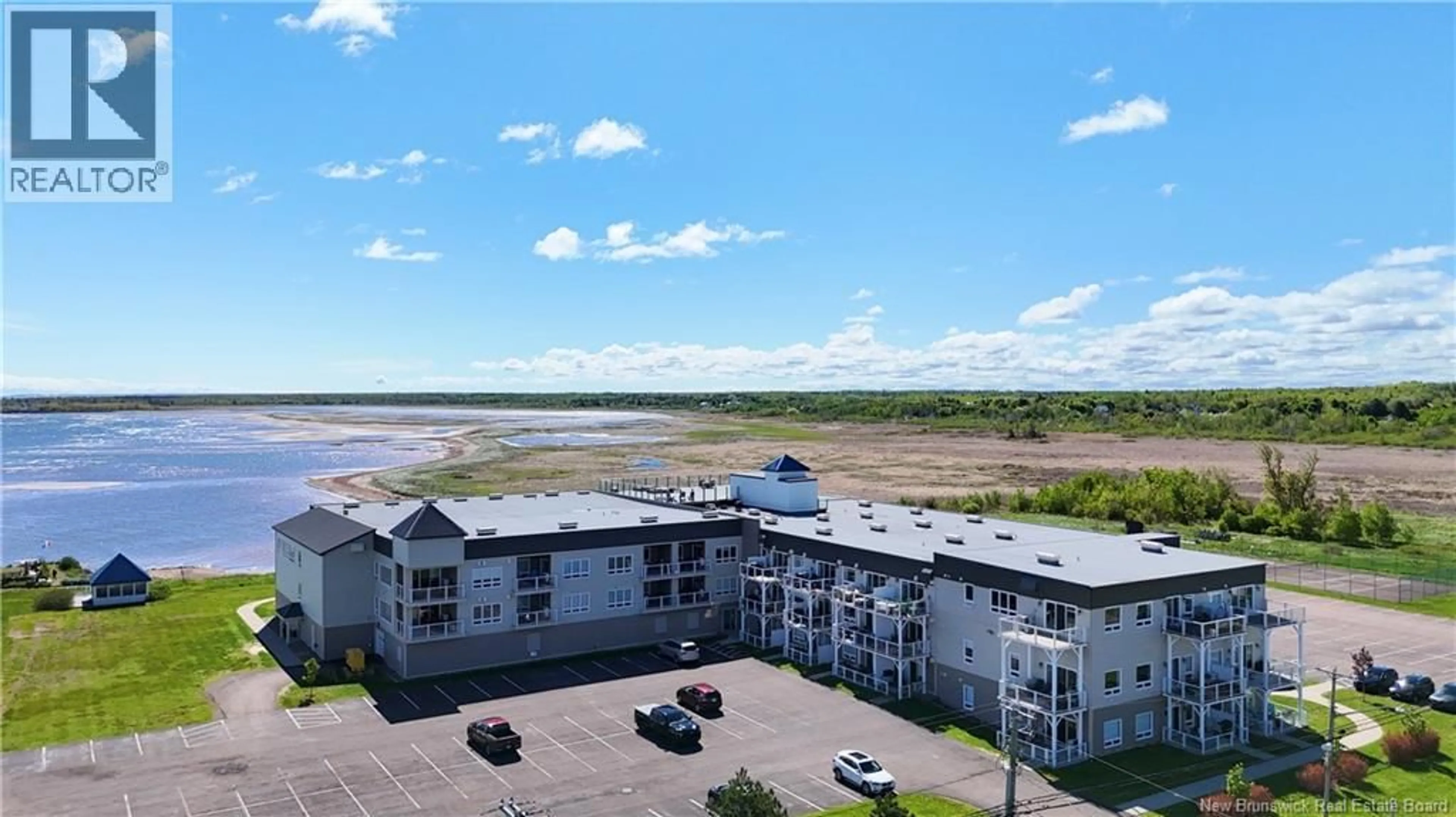 A pic from outside/outdoor area/front of a property/back of a property/a pic from drone, water/lake/river/ocean view for 106 - 69 CAP BIMET BOULEVARD, Grand-Barachois New Brunswick E4P6X5