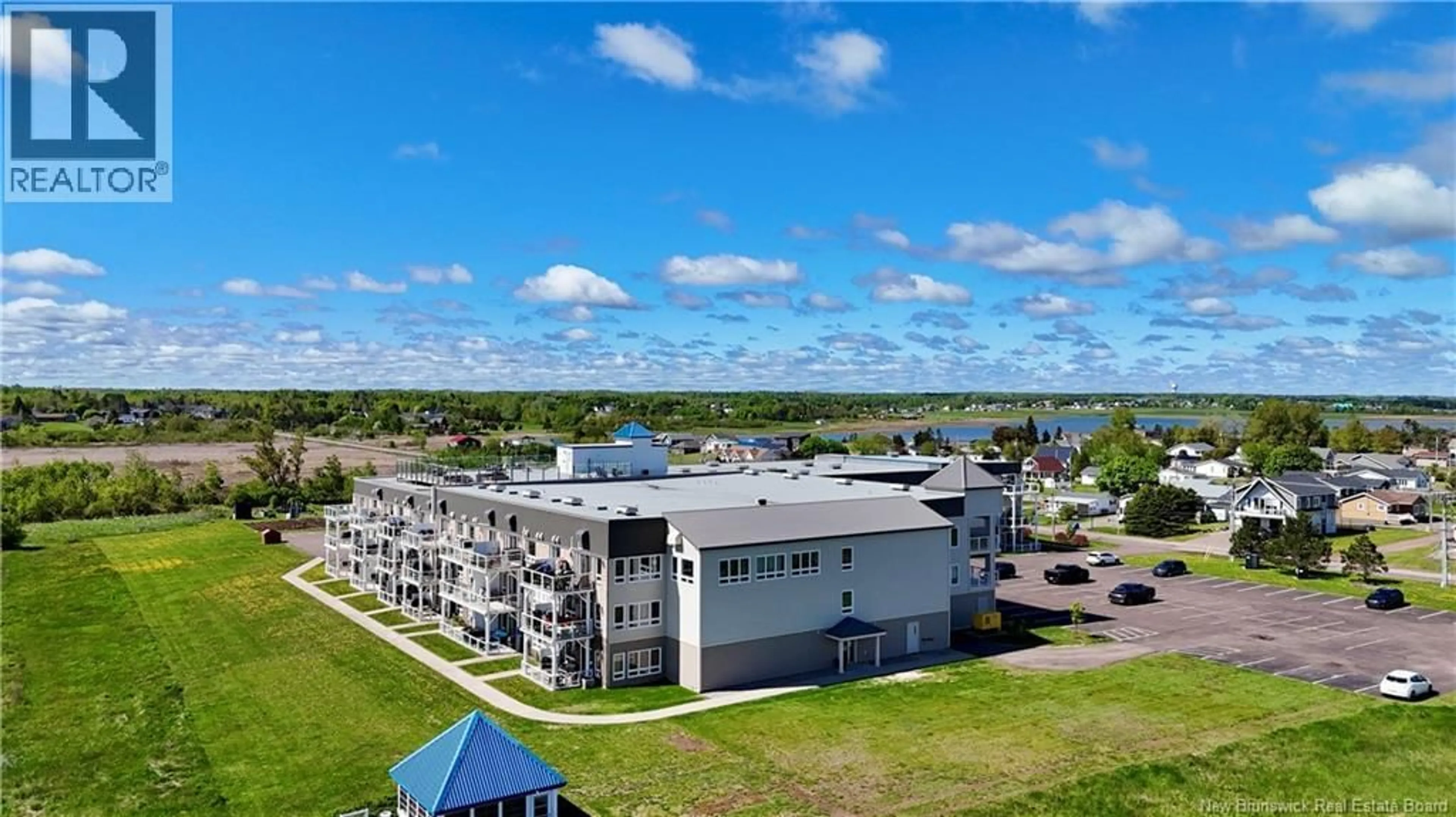A pic from outside/outdoor area/front of a property/back of a property/a pic from drone, water/lake/river/ocean view for 106 - 69 CAP BIMET BOULEVARD, Grand-Barachois New Brunswick E4P6X5