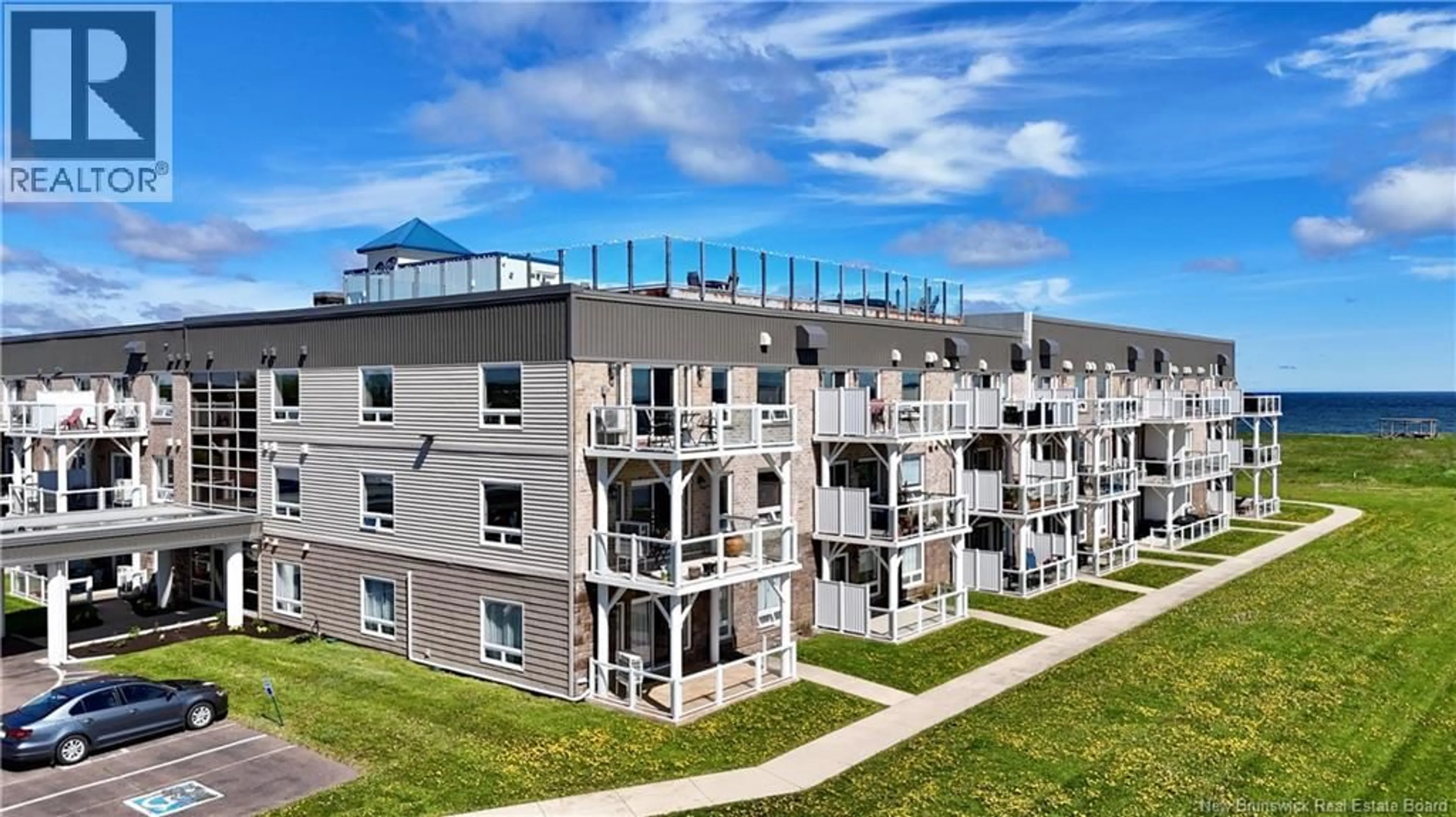 A pic from outside/outdoor area/front of a property/back of a property/a pic from drone, building for 106 - 69 CAP BIMET BOULEVARD, Grand-Barachois New Brunswick E4P6X5