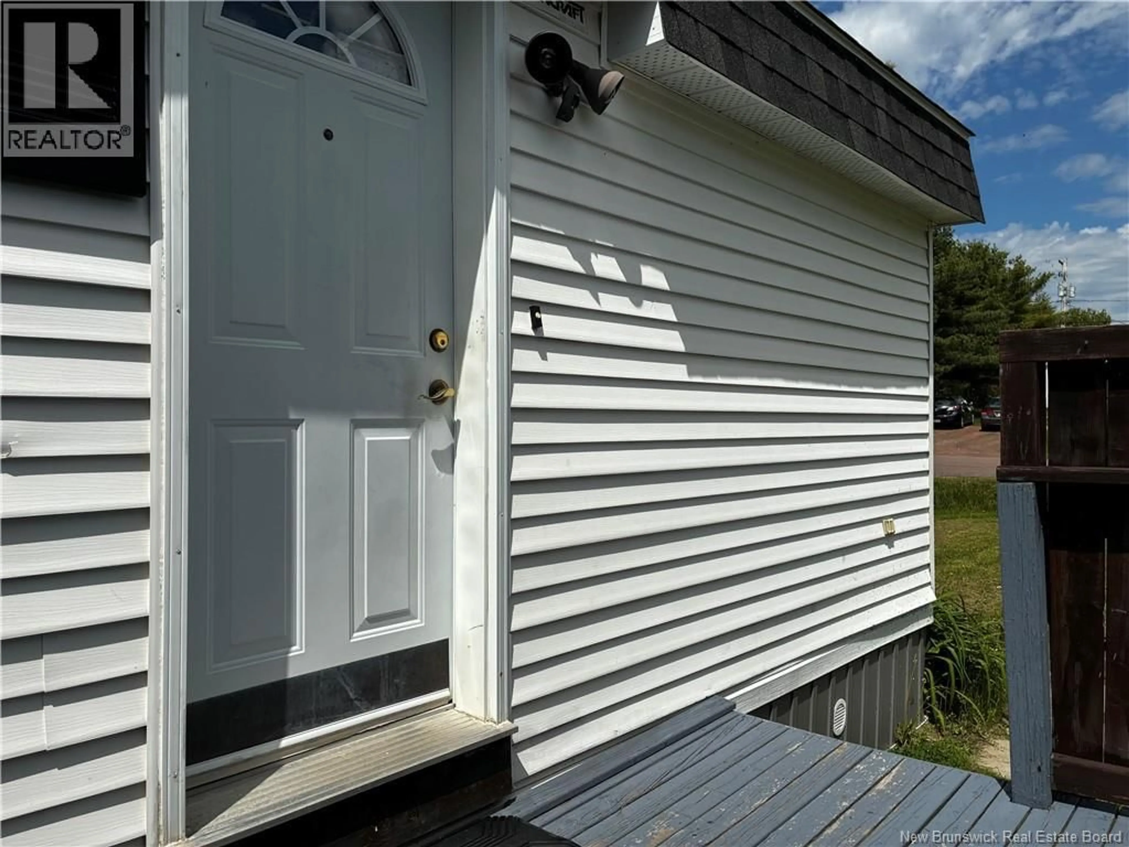 Home with vinyl exterior material, street for 52 DUPUIS AVENUE, Lakeville New Brunswick E1H1E2