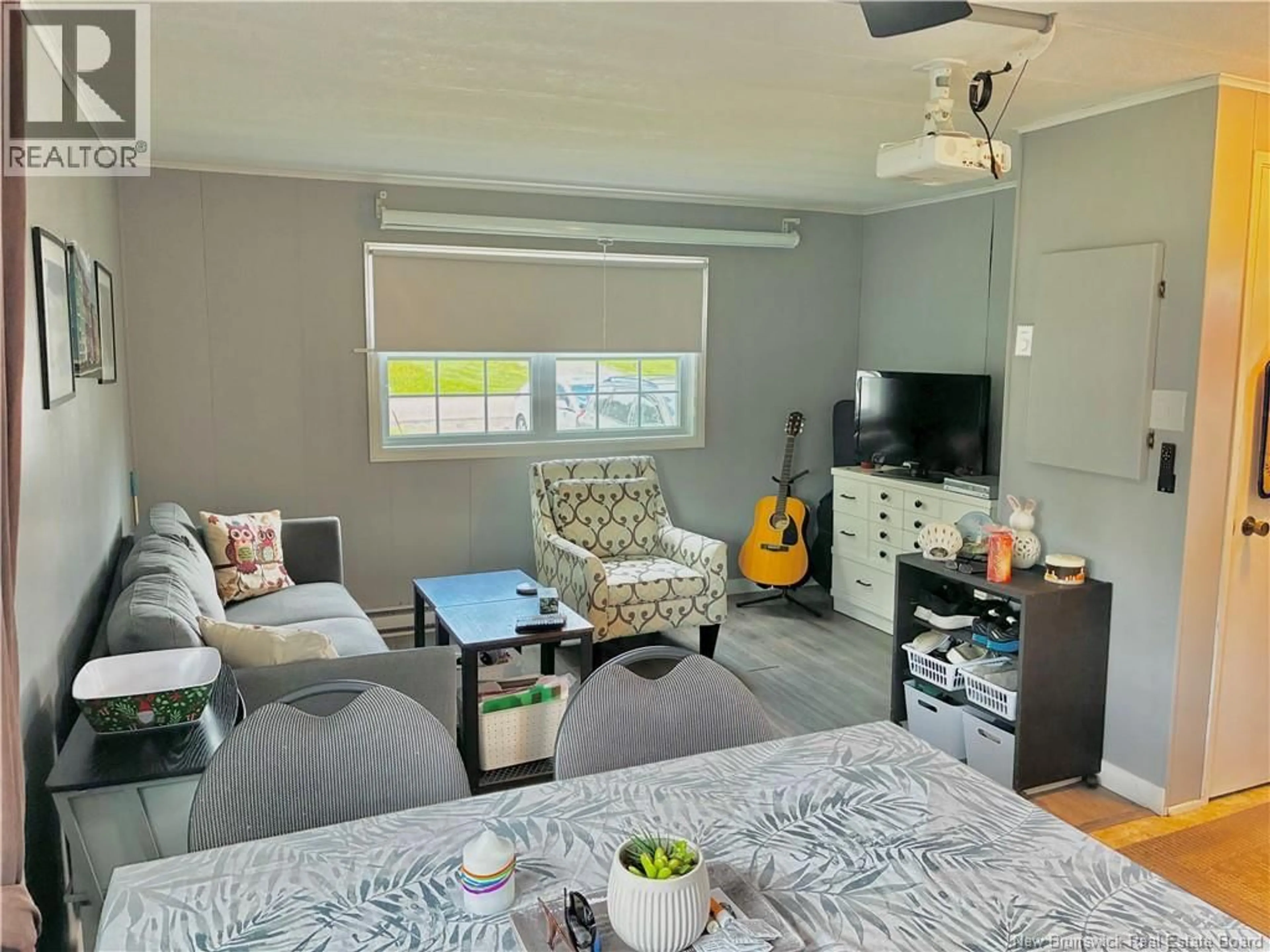 Living room with furniture, unknown for 52 DUPUIS AVENUE, Lakeville New Brunswick E1H1E2