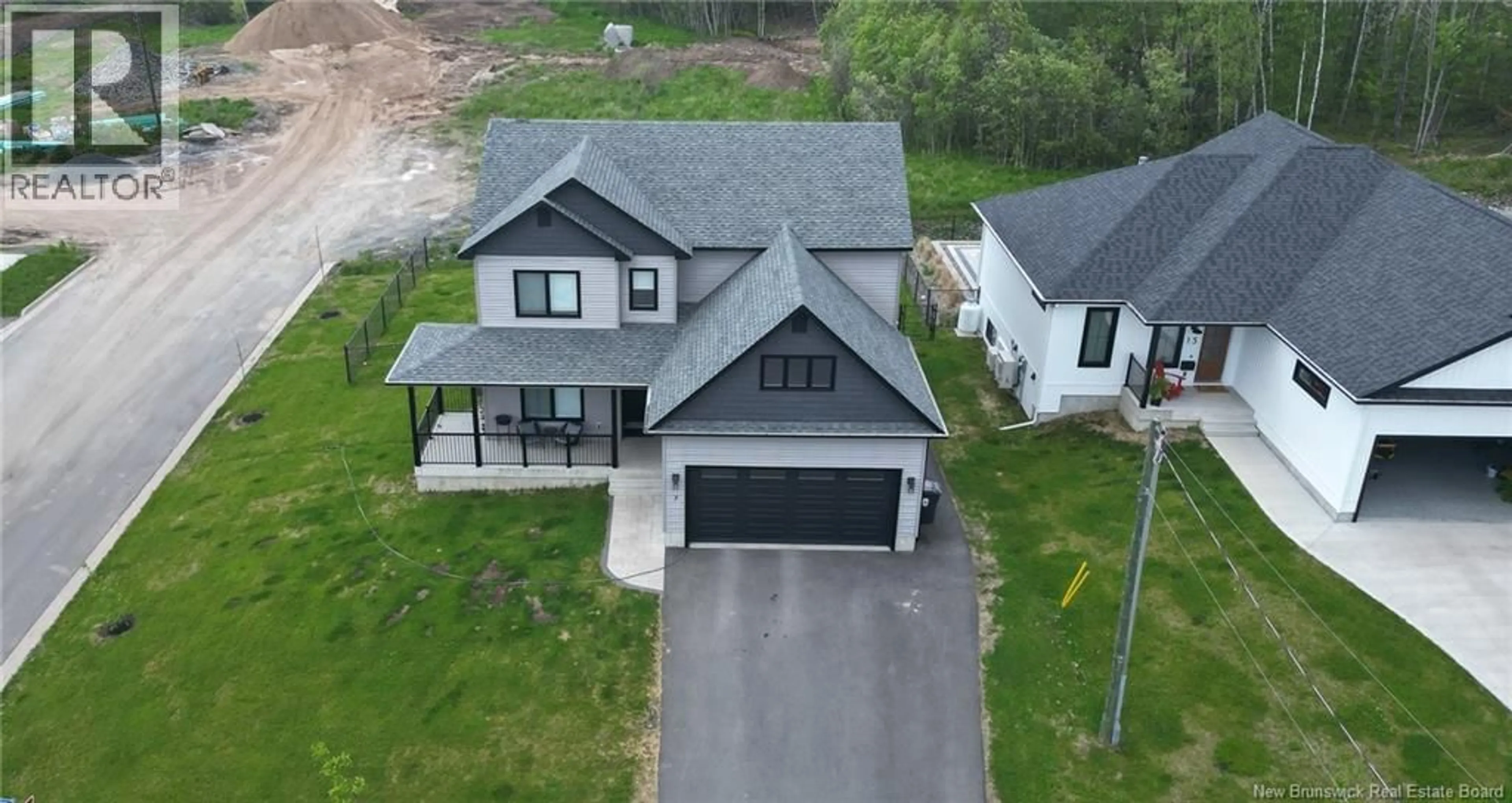 A pic from outside/outdoor area/front of a property/back of a property/a pic from drone, street for 7 AURORA STREET, Fredericton New Brunswick E3G0L3