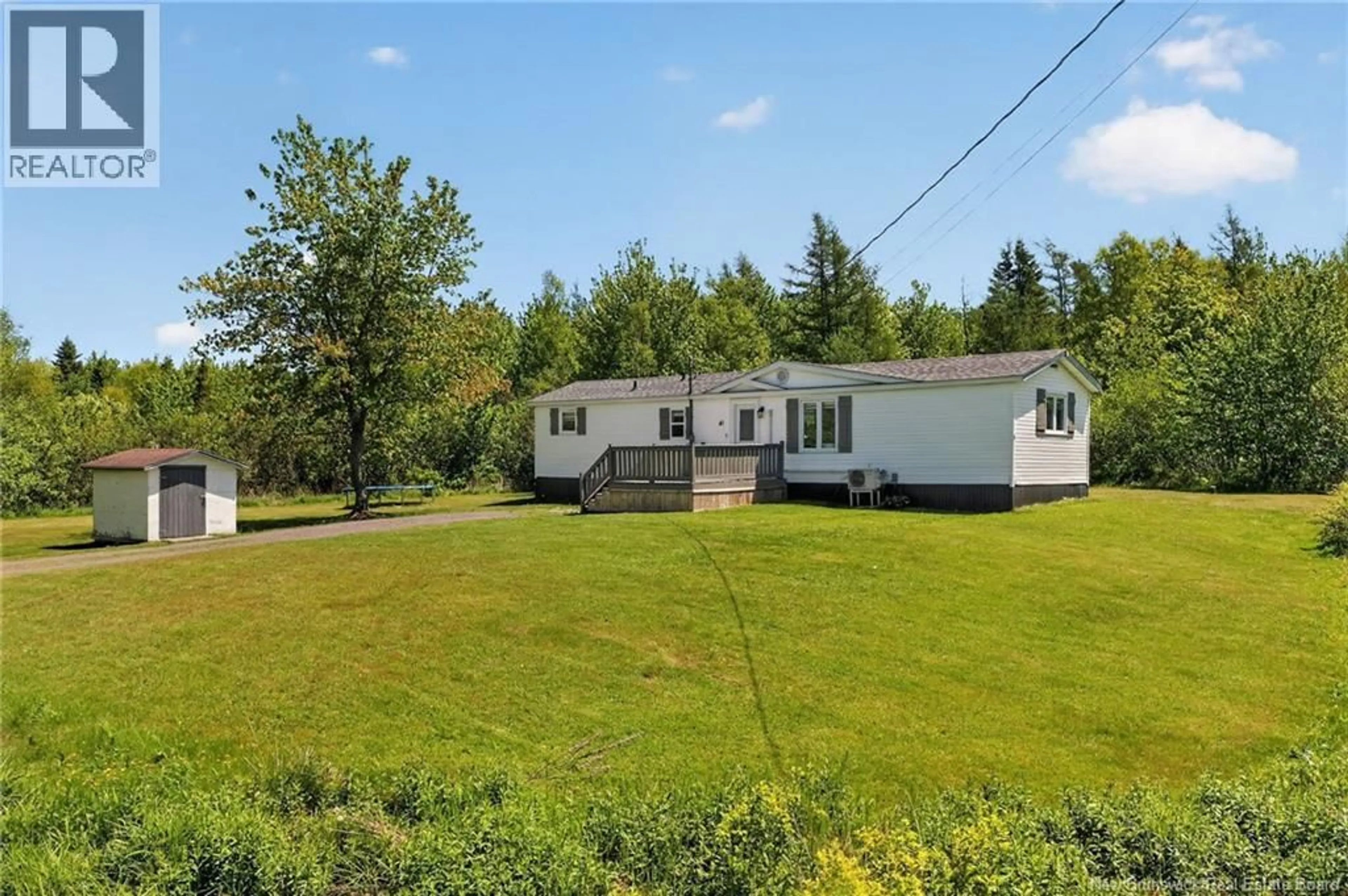 A pic from outside/outdoor area/front of a property/back of a property/a pic from drone, water/lake/river/ocean view for 41 MARCELIN STREET, Scoudouc New Brunswick E4P1A3