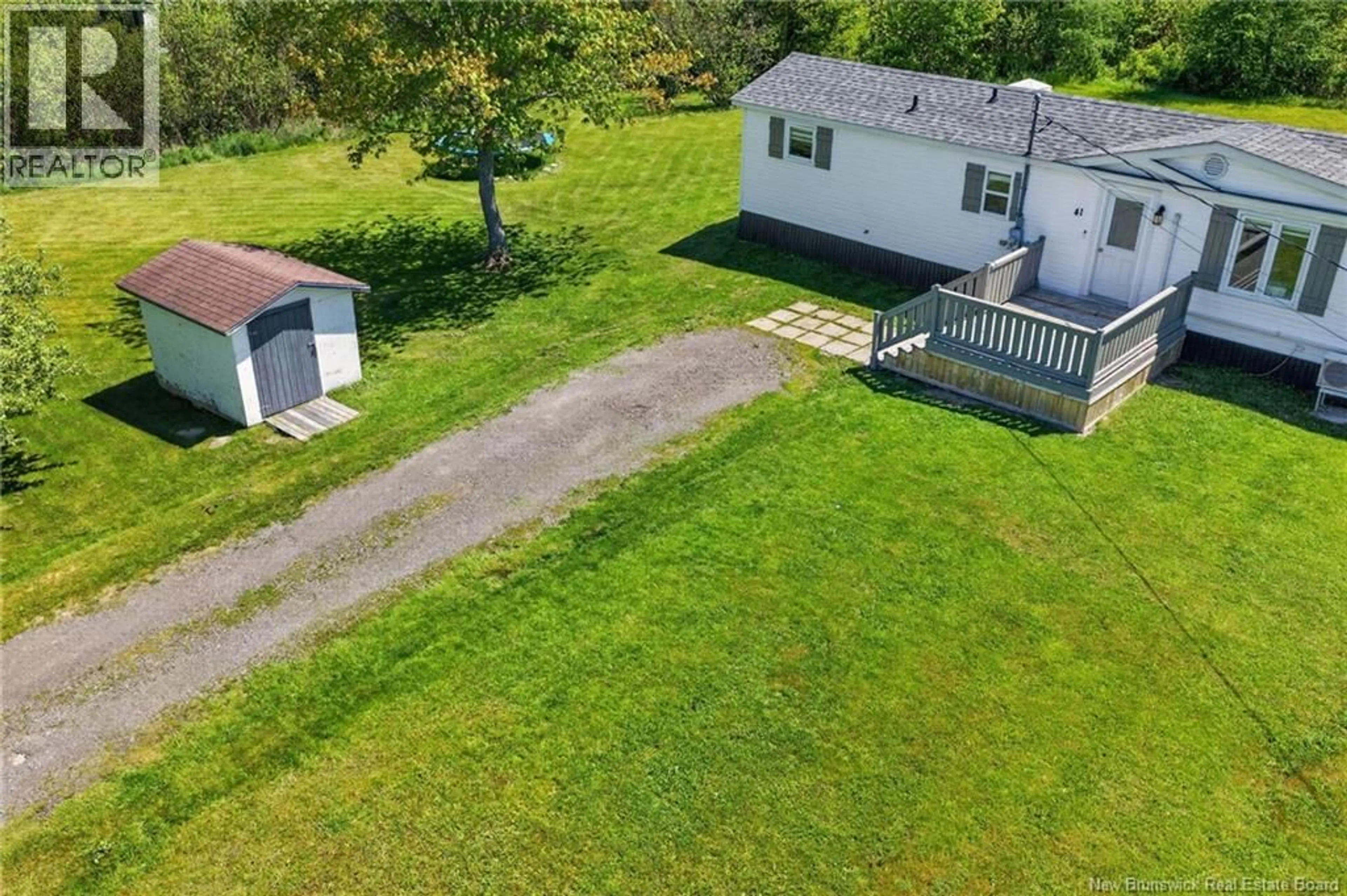 A pic from outside/outdoor area/front of a property/back of a property/a pic from drone, water/lake/river/ocean view for 41 MARCELIN STREET, Scoudouc New Brunswick E4P1A3