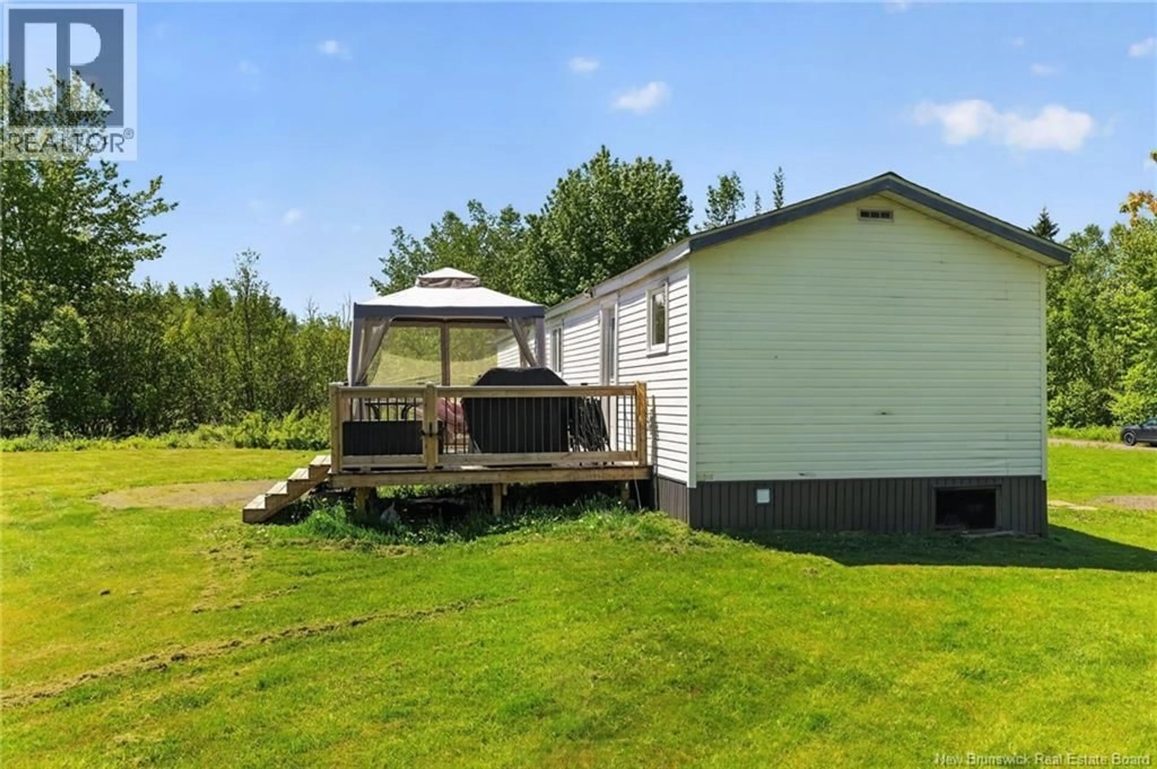 A pic from outside/outdoor area/front of a property/back of a property/a pic from drone, water/lake/river/ocean view for 41 MARCELIN STREET, Scoudouc New Brunswick E4P1A3