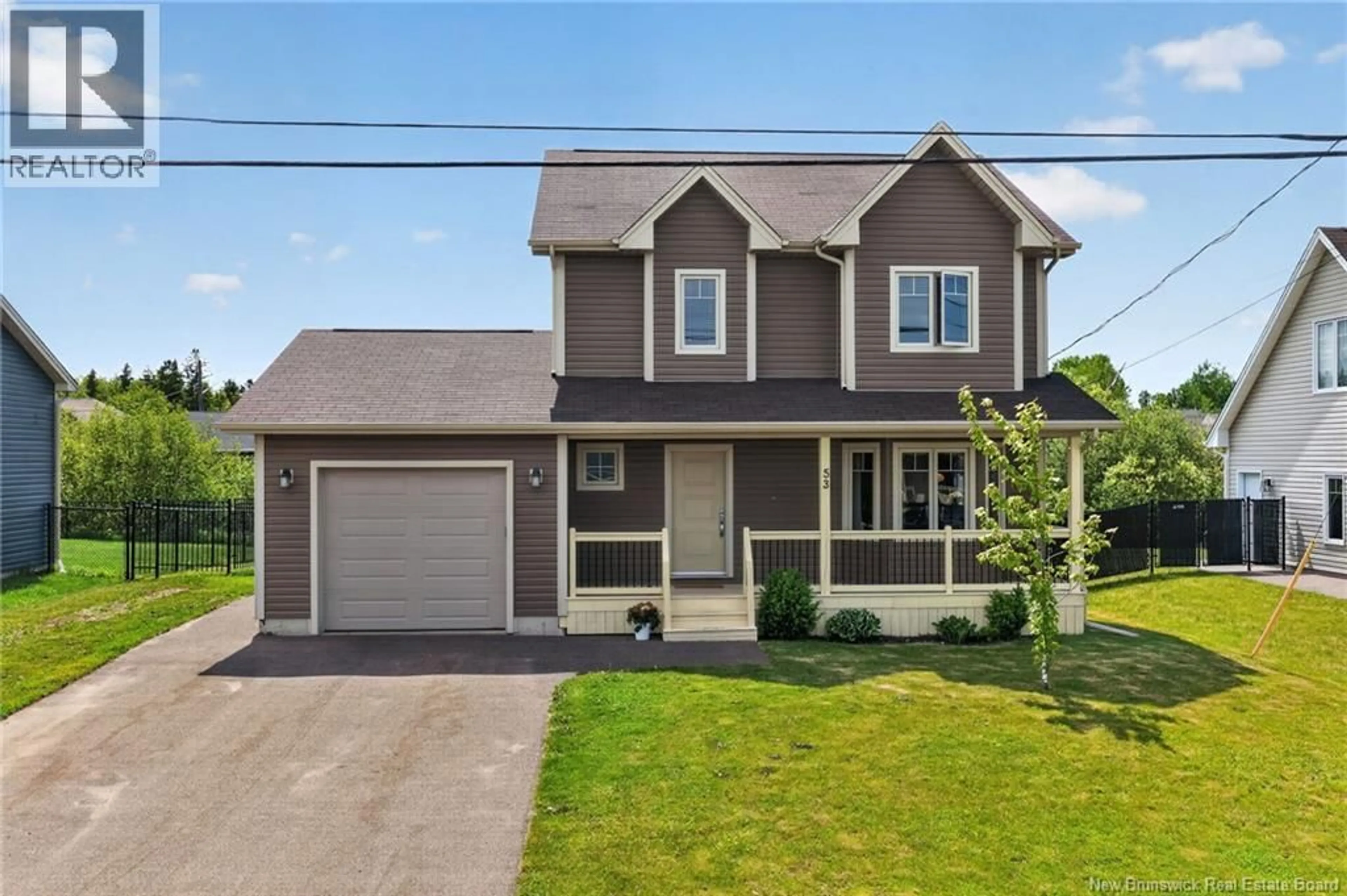 Home with vinyl exterior material, street for 53 LAFOREST STREET, Shediac New Brunswick E4P0P7