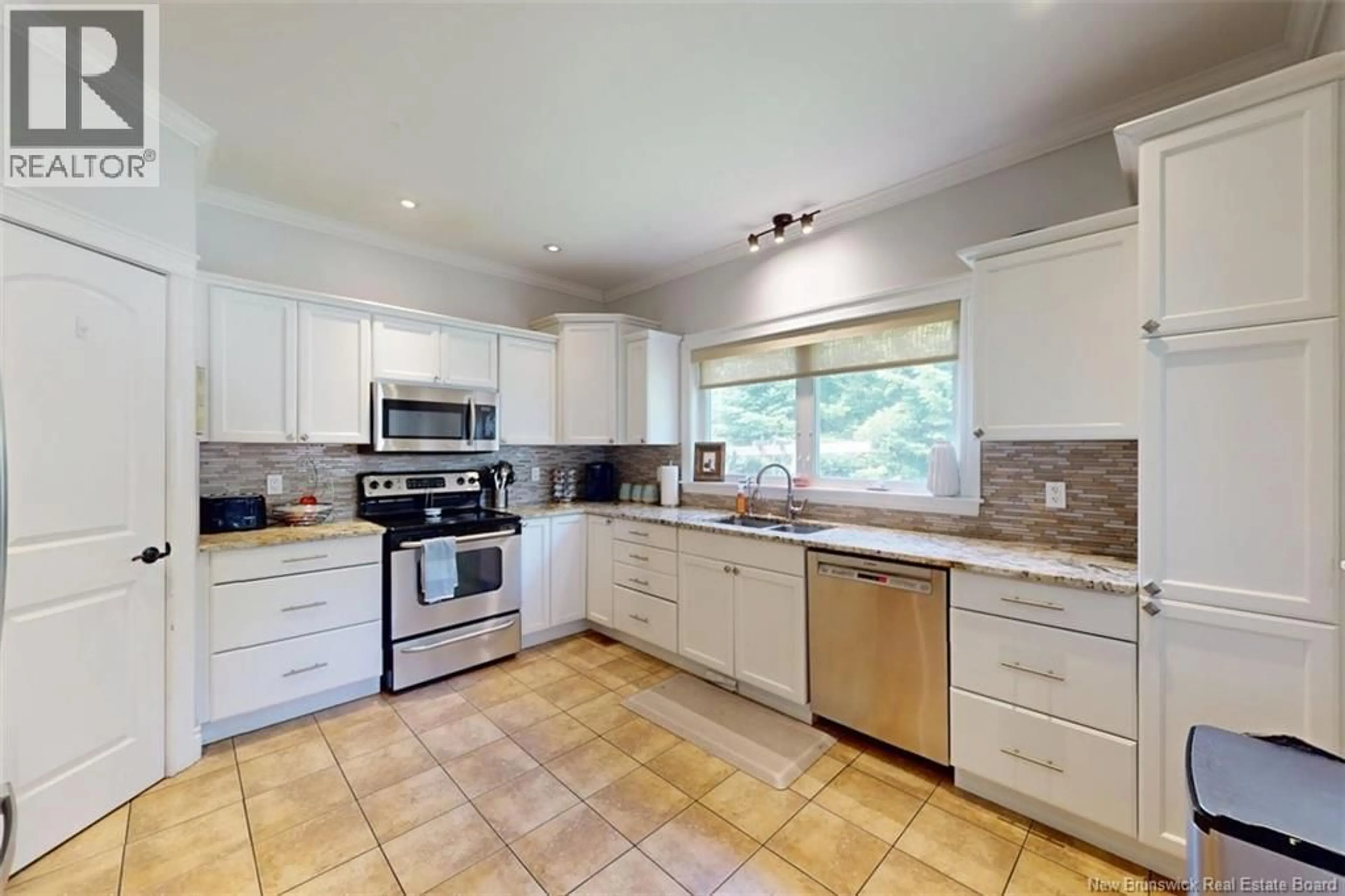 Open concept kitchen, ceramic/tile floor for 32 GRANITE DRIVE, Quispamsis New Brunswick E2E0E4