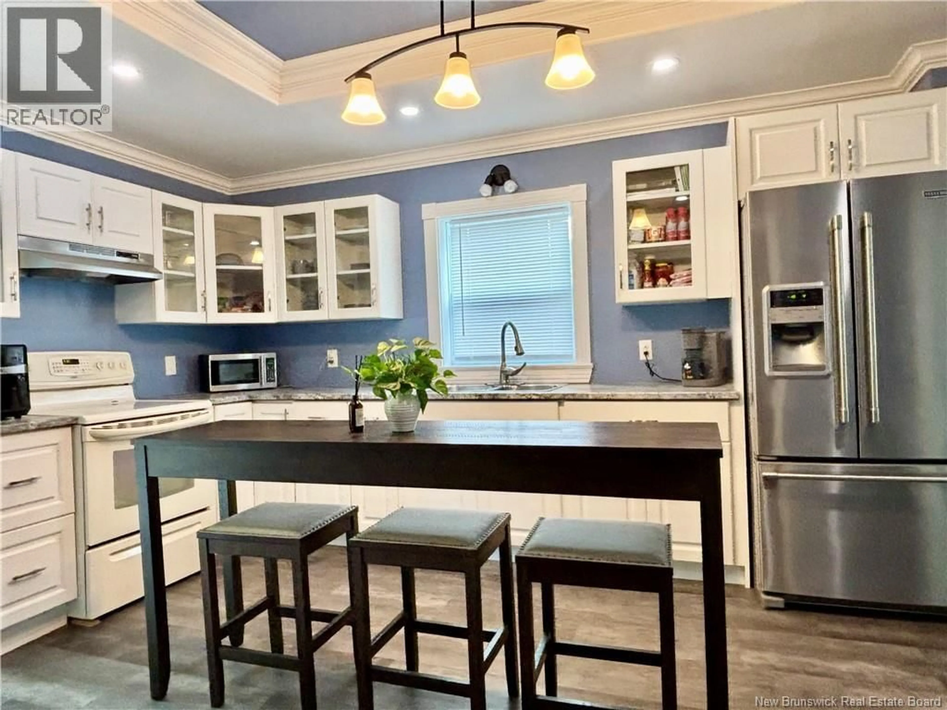 Open concept kitchen, ceramic/tile floor for 519 KING GEORGE HWY, Miramichi New Brunswick E1V1M9
