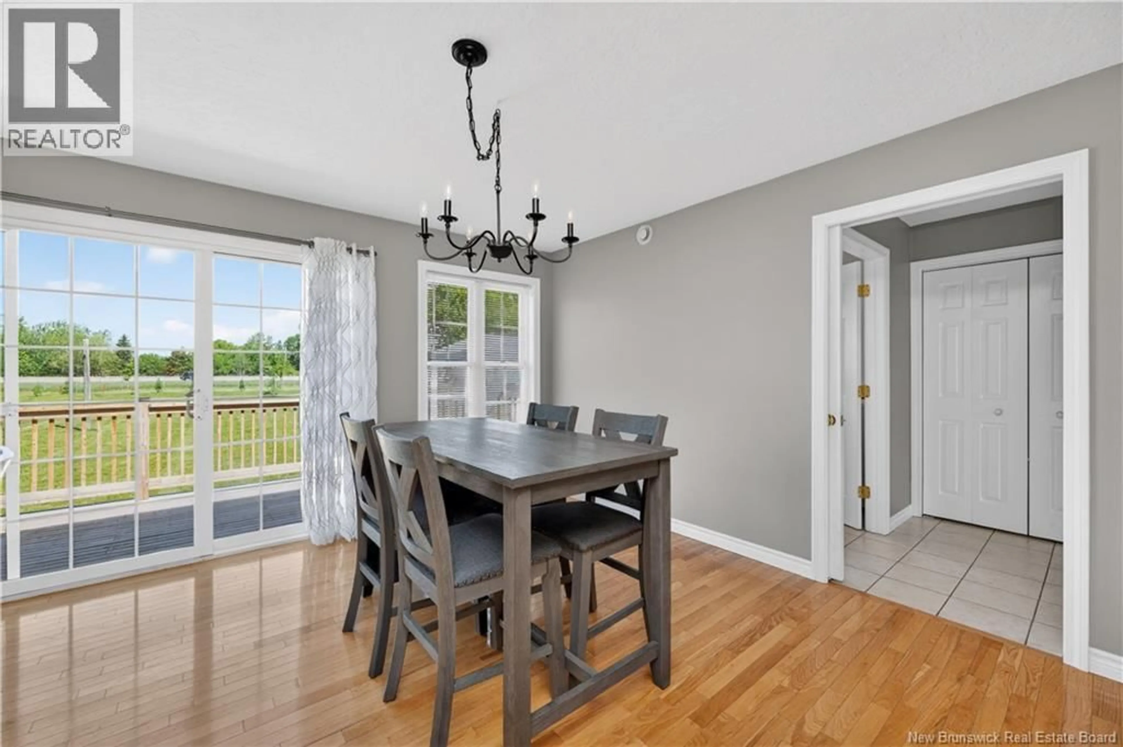Dining room, wood/laminate floor for 13 MAPLE STREET, Petitcodiac New Brunswick E4Z4M5