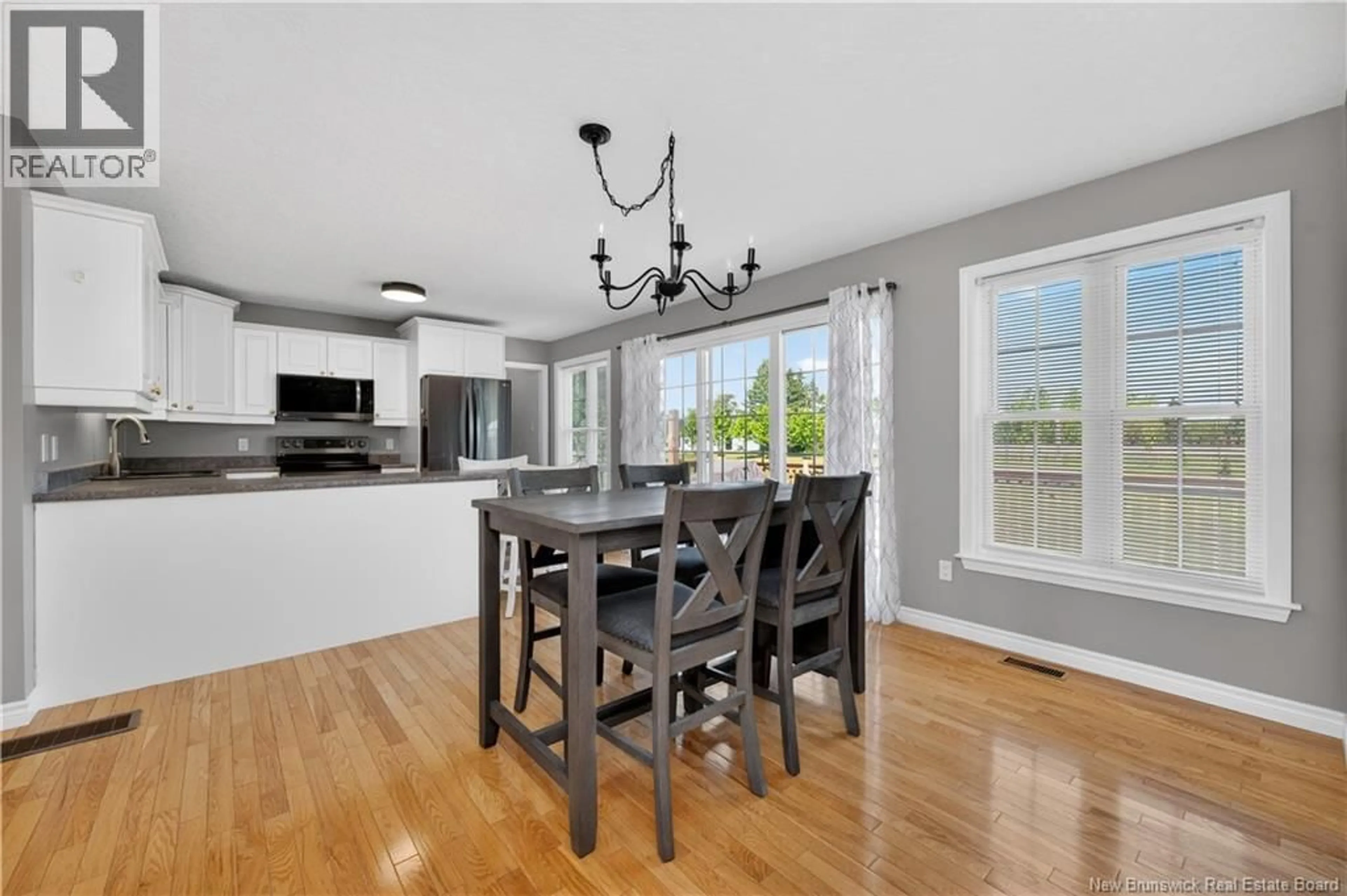 Open concept kitchen, wood/laminate floor for 13 MAPLE STREET, Petitcodiac New Brunswick E4Z4M5