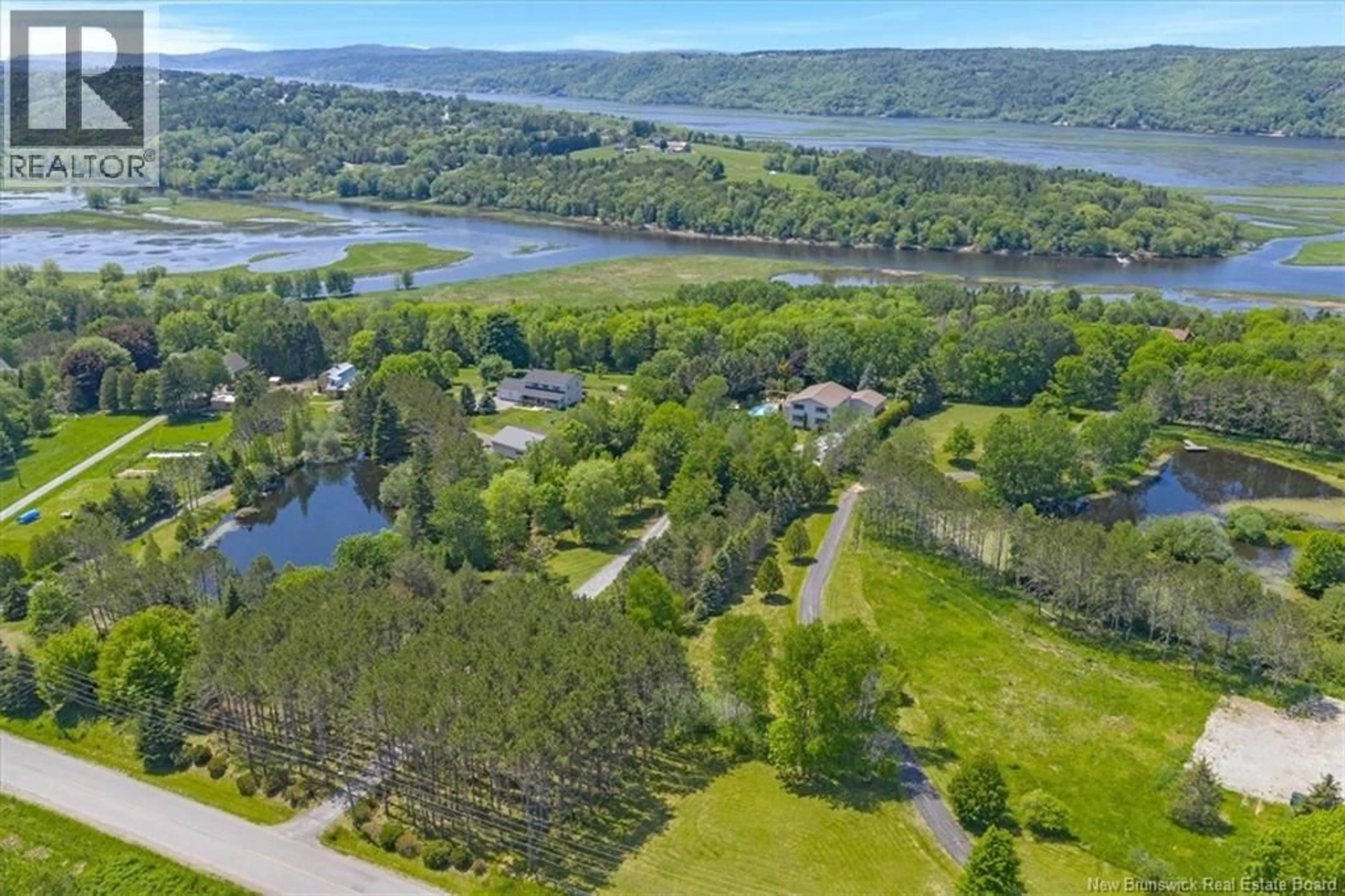 A pic from outside/outdoor area/front of a property/back of a property/a pic from drone, water/lake/river/ocean view for 267 DARLINGS ISLAND ROAD, Darlings Island New Brunswick E5N6S4
