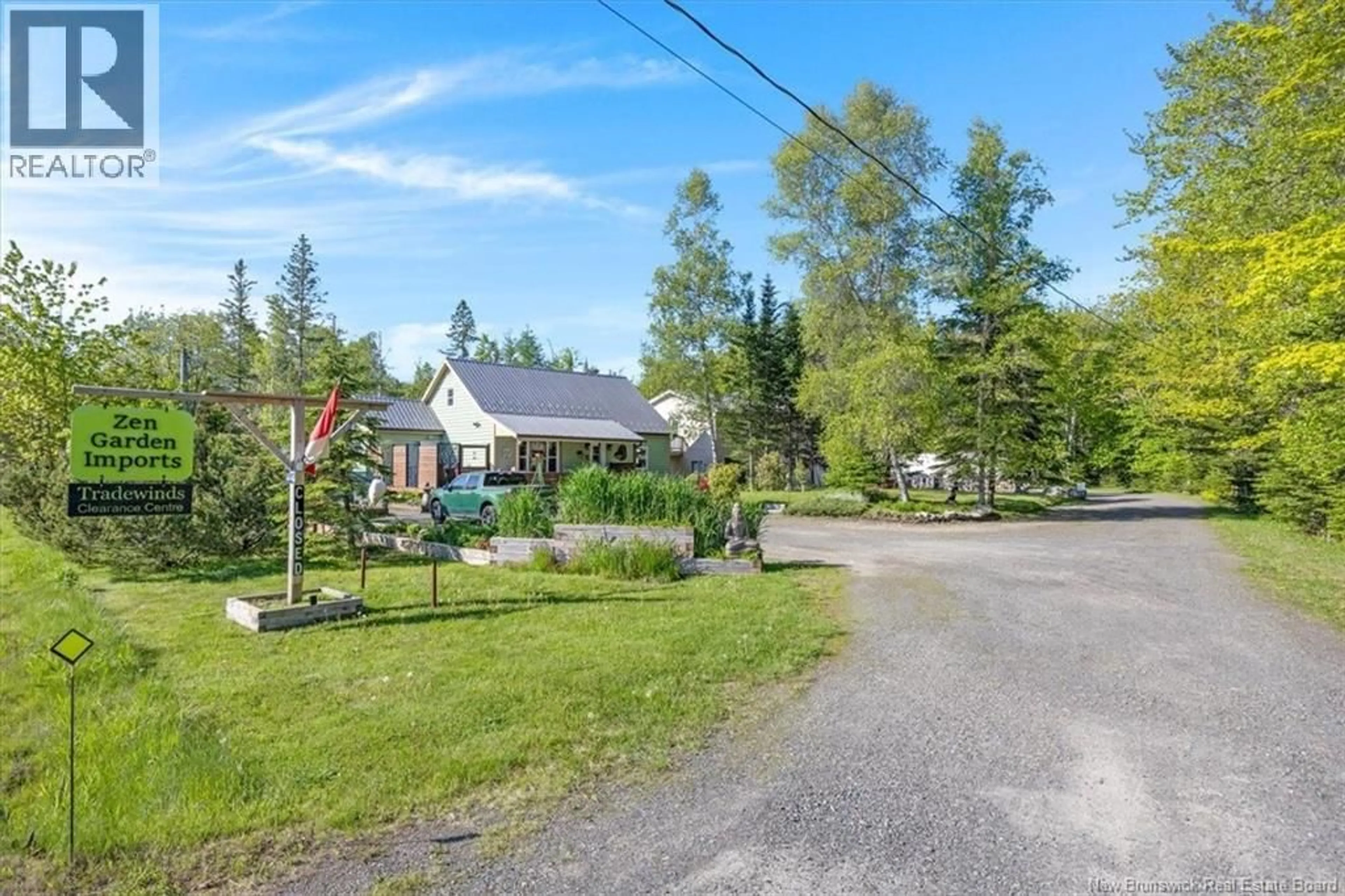 A pic from outside/outdoor area/front of a property/back of a property/a pic from drone, street for 4440 ROUTE 127, Saint Andrews New Brunswick E5B3A1