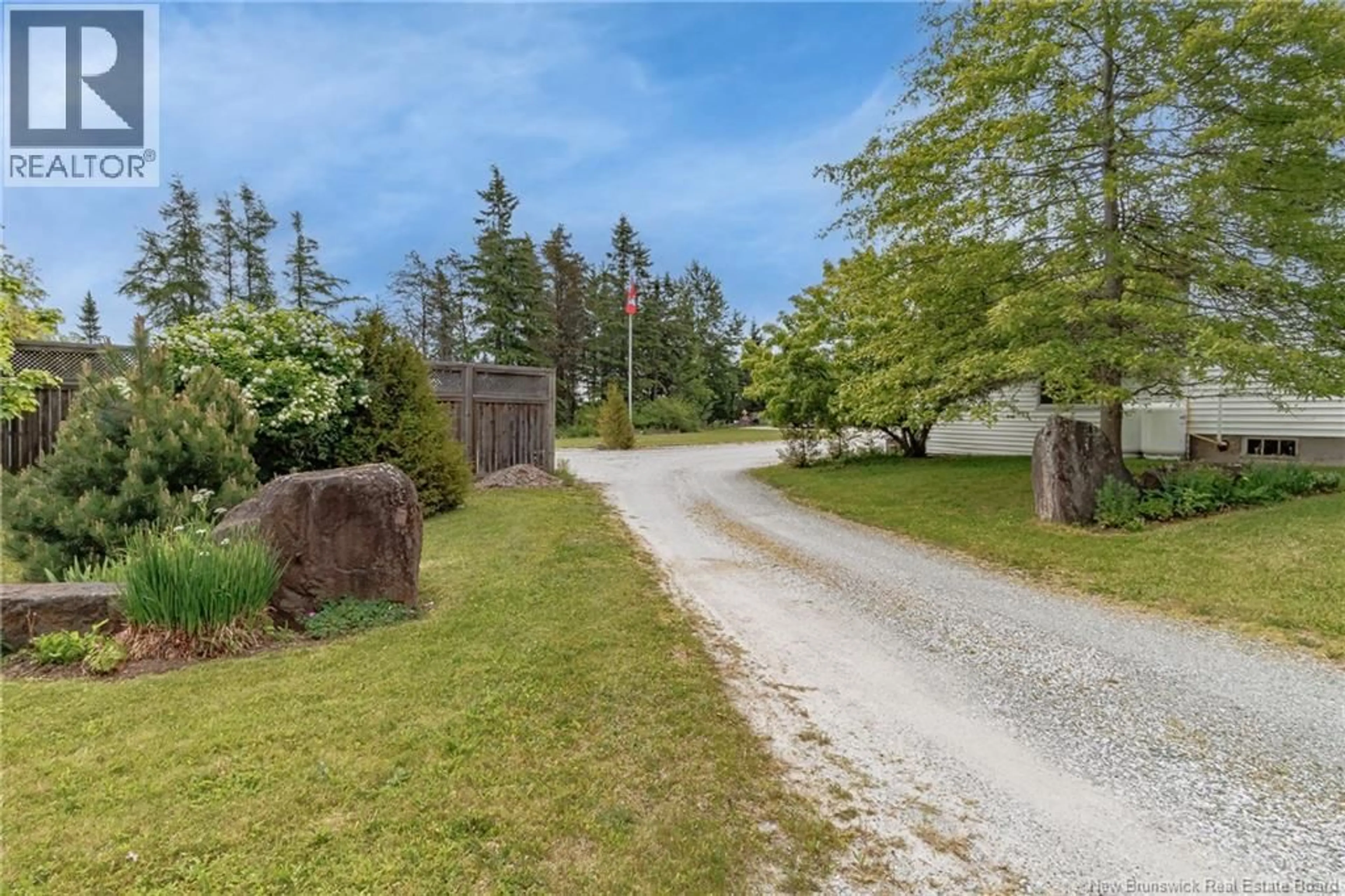 A pic from outside/outdoor area/front of a property/back of a property/a pic from drone, unknown for 416 HAMPTON ROAD, Quispamsis New Brunswick E2E4V5