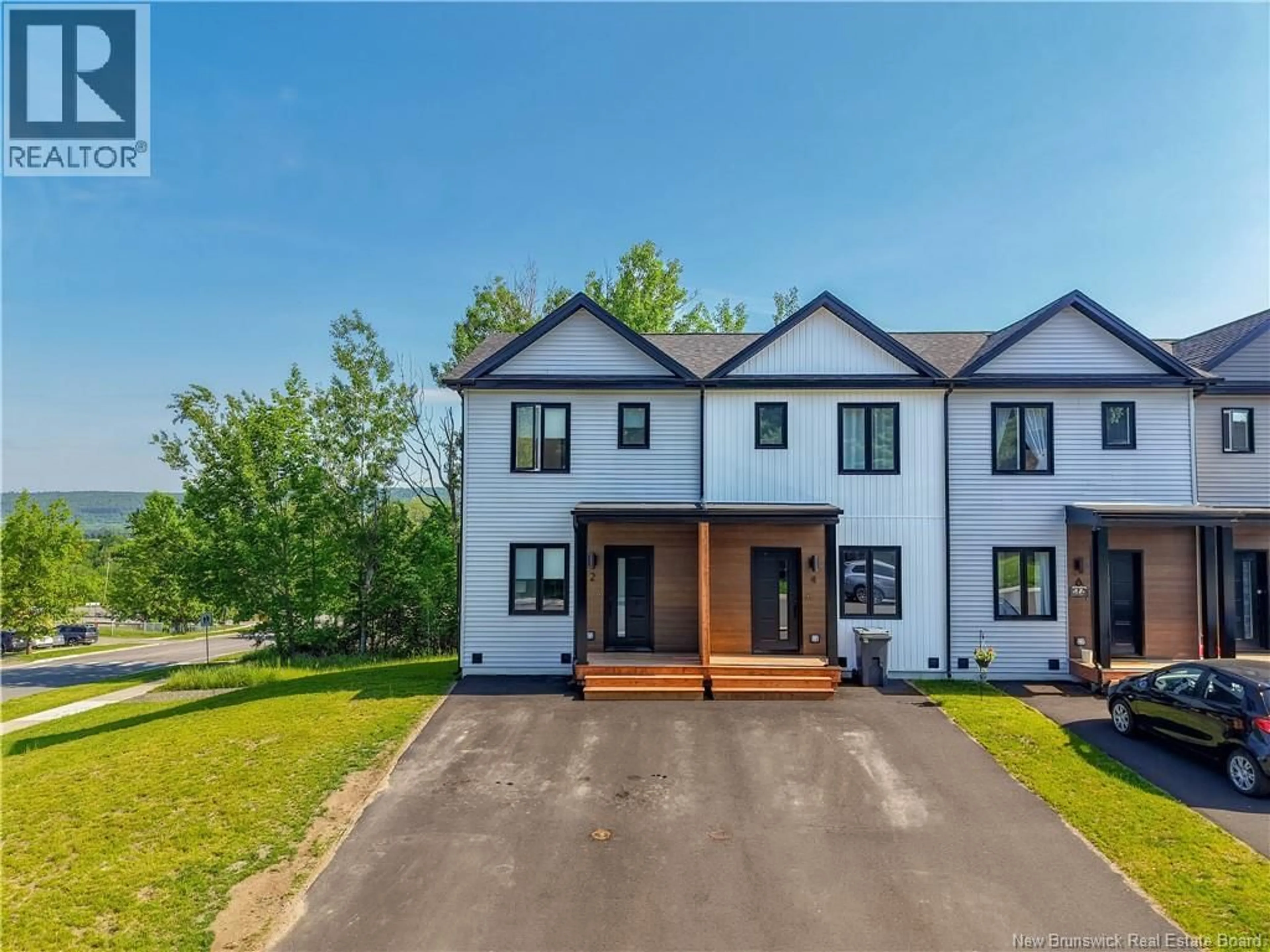 A pic from outside/outdoor area/front of a property/back of a property/a pic from drone, unknown for 2 WESTWOOD DRIVE, Fredericton New Brunswick E3C1K7