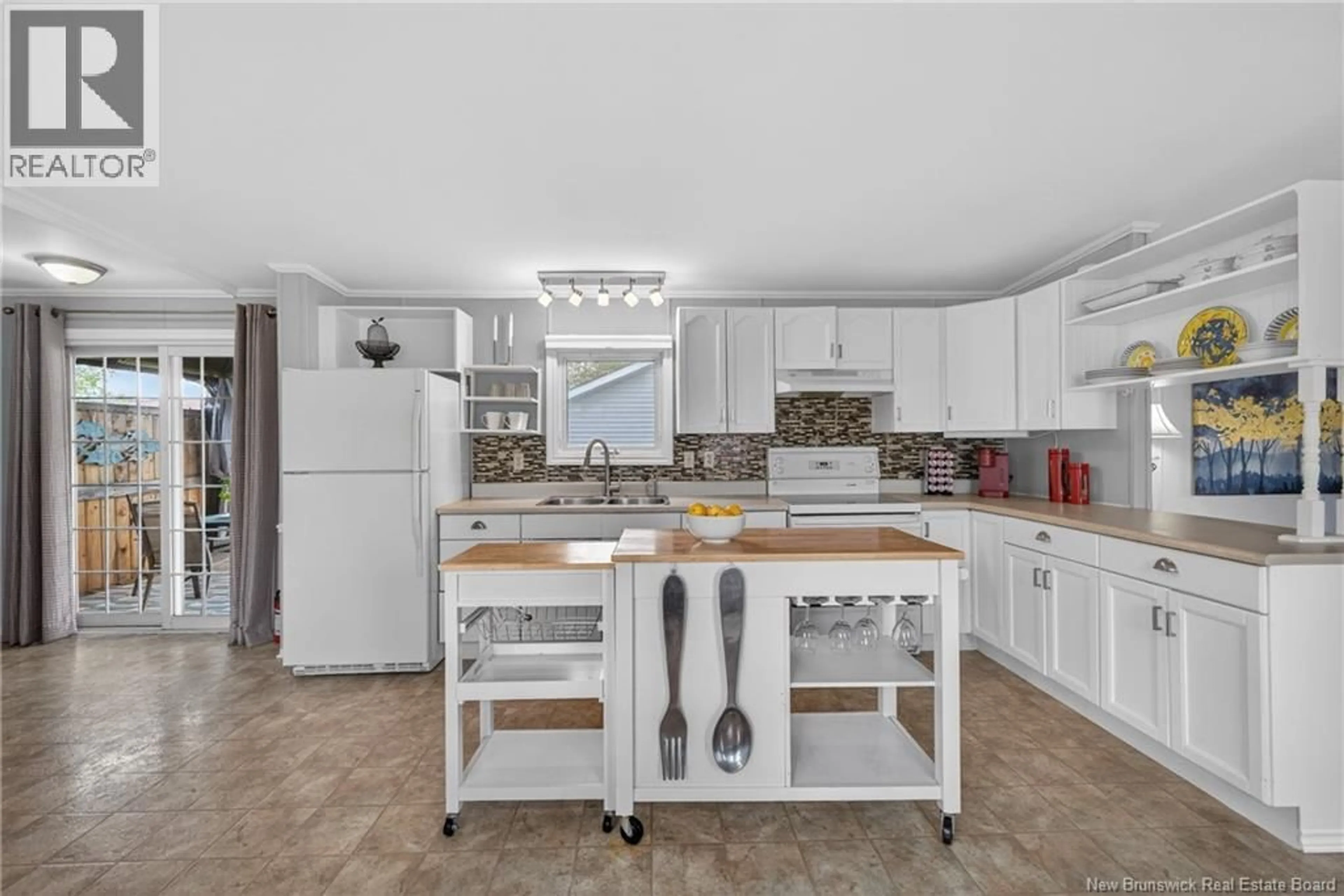Open concept kitchen, ceramic/tile floor for 26 ZURICH COURT, Moncton New Brunswick E1H3C4