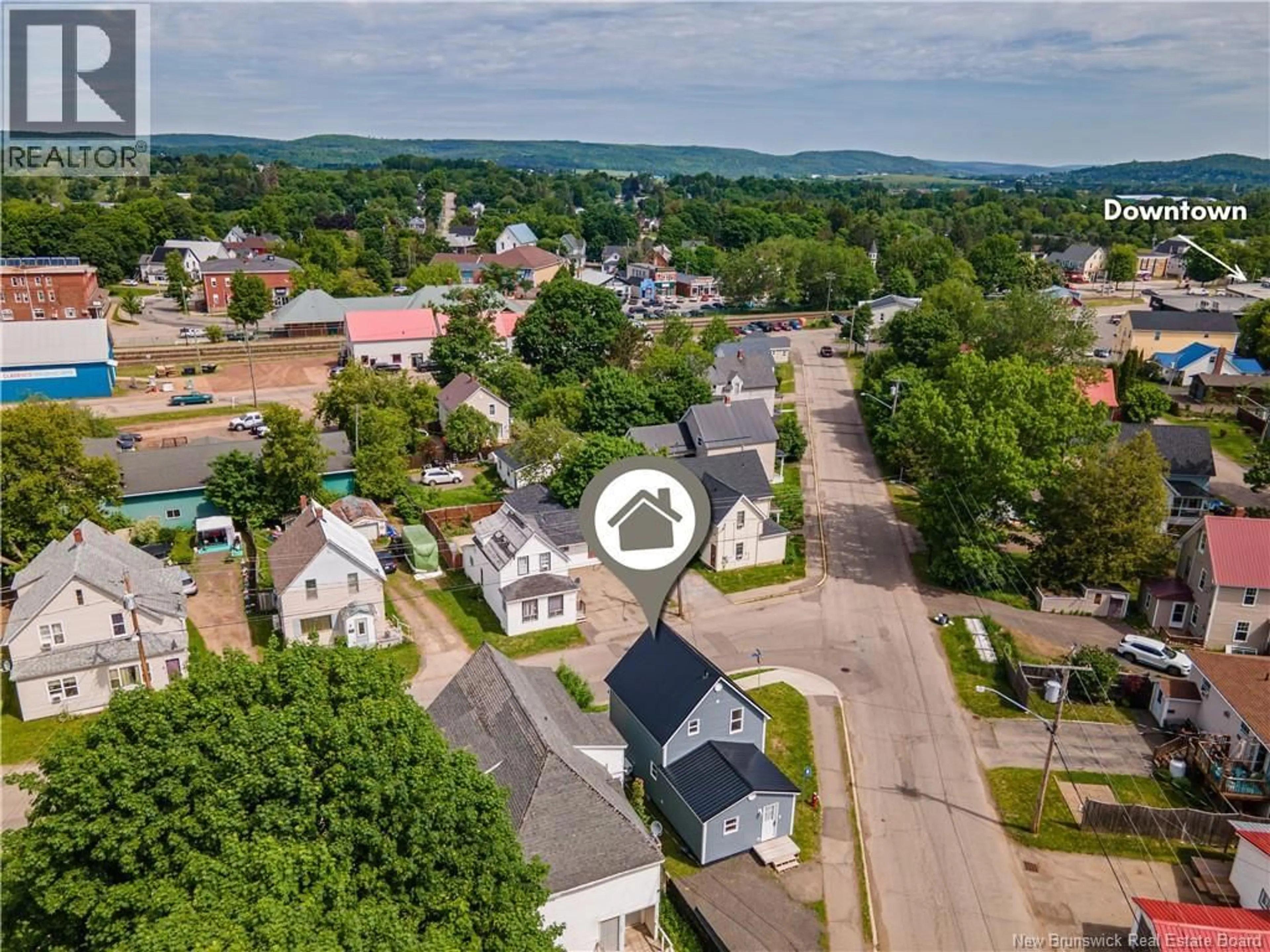 A pic from outside/outdoor area/front of a property/back of a property/a pic from drone, street for 2 NELSON STREET, Sussex New Brunswick E4E1V5
