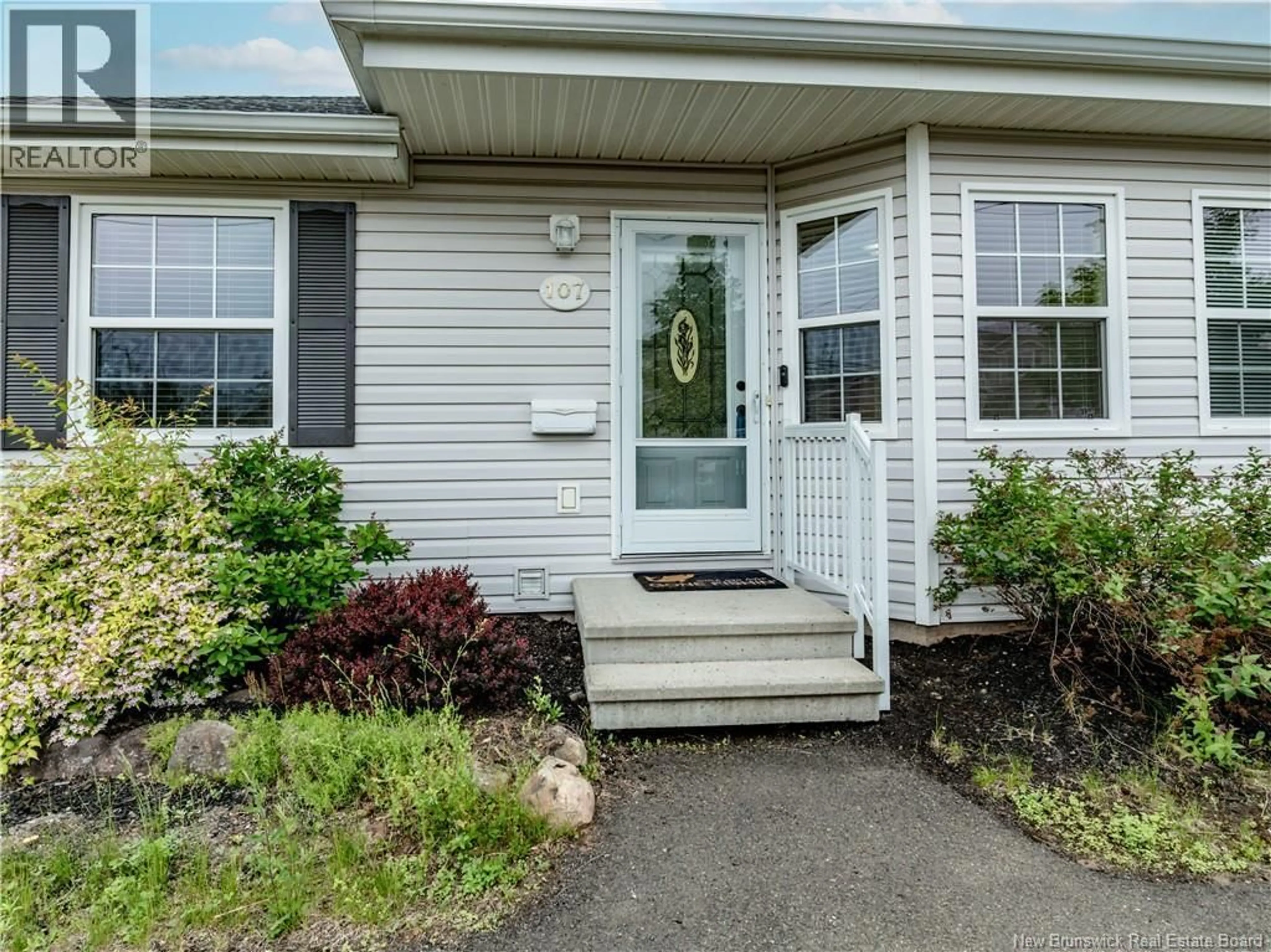 Home with vinyl exterior material, street for 107 FIRMIN, Dieppe New Brunswick E1A8G3