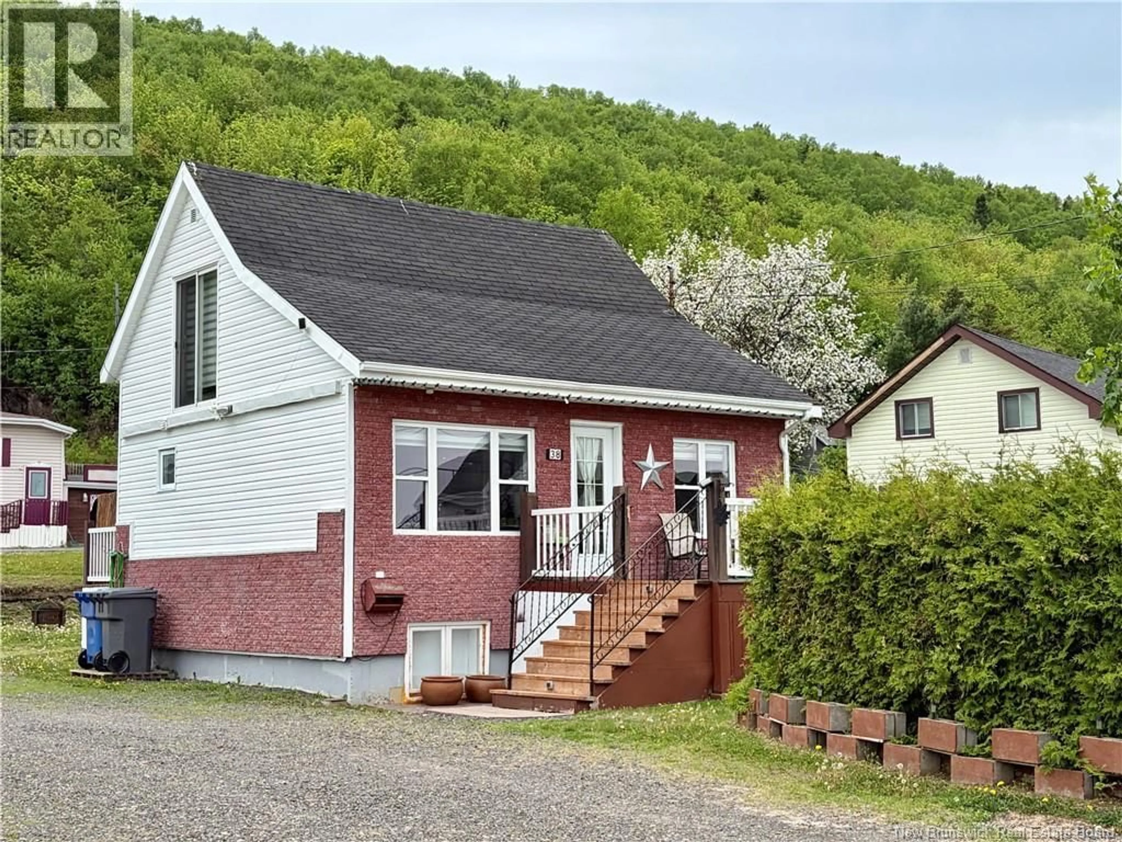 Home with vinyl exterior material, street for 38 SUNSET, Campbellton New Brunswick E3N1S8