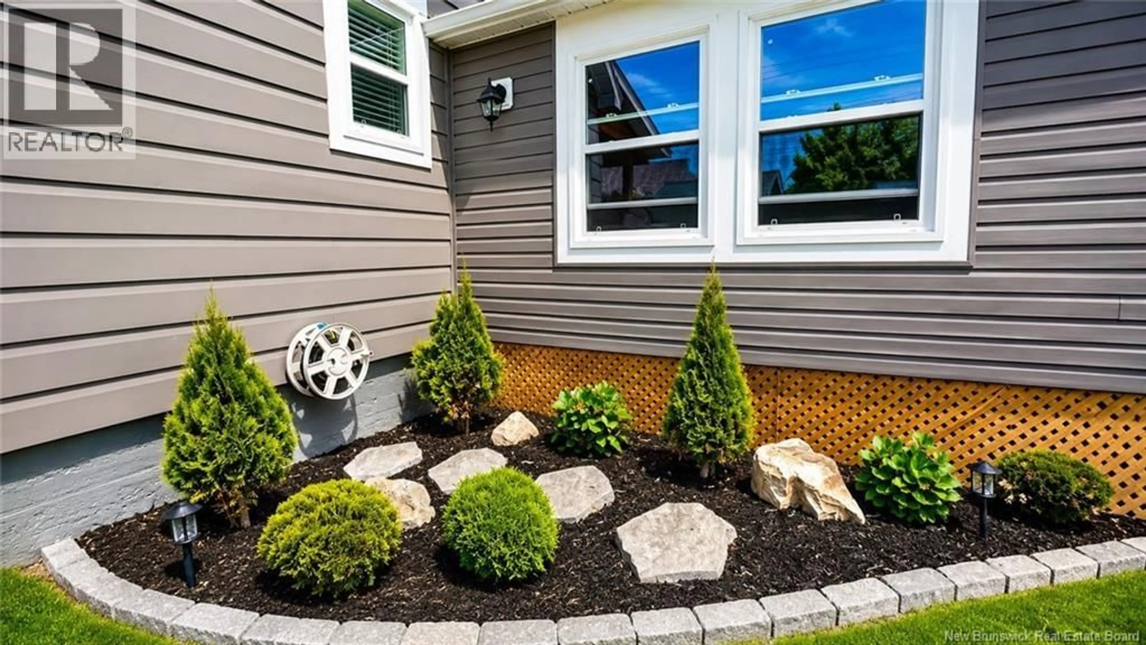 Home with vinyl exterior material, street for 146 ORANGE STREET, Woodstock New Brunswick E7M2A7