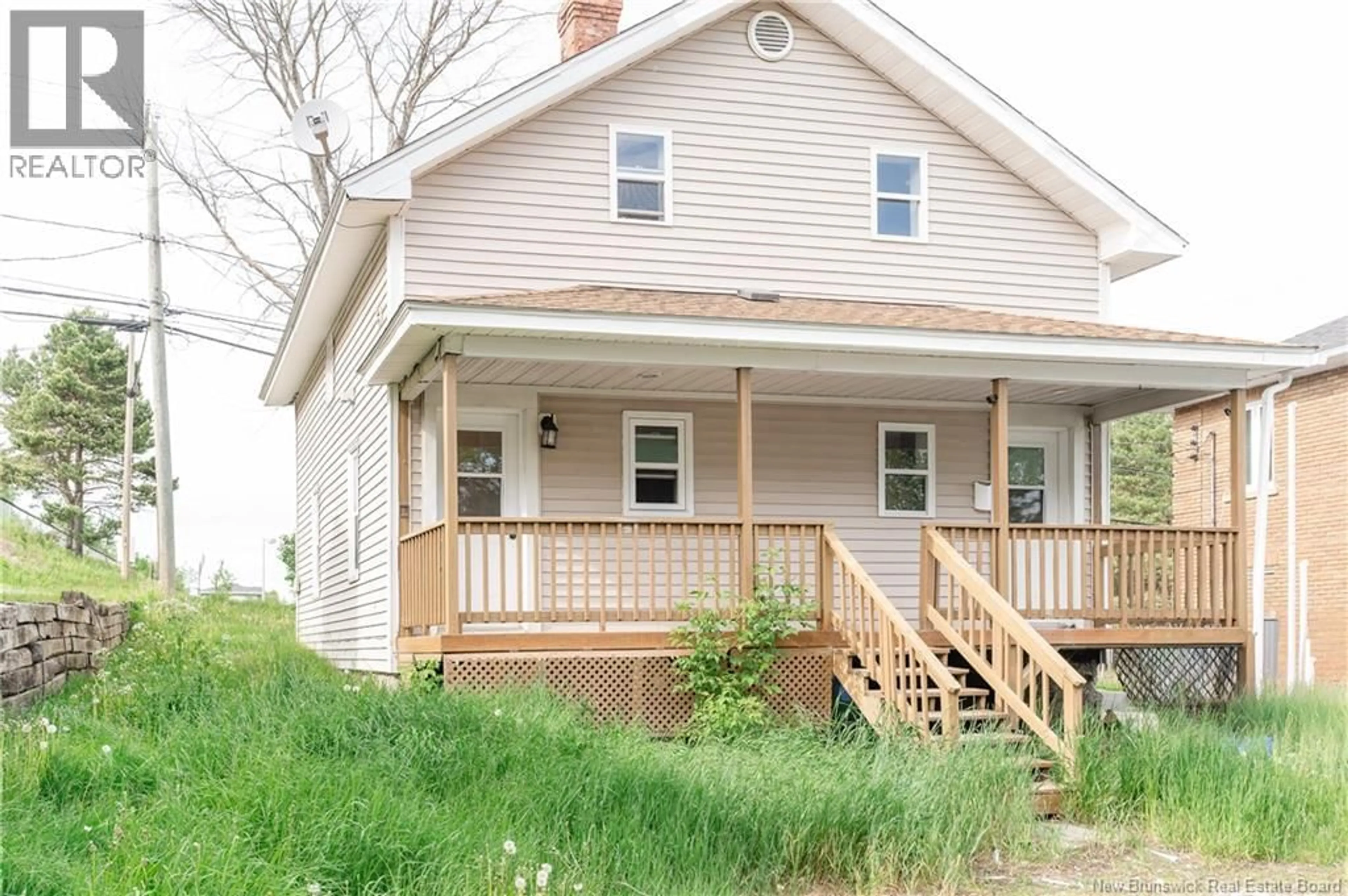 Home with vinyl exterior material, street for 16 BELLEVUE STREET, Edmundston New Brunswick E3V2C7