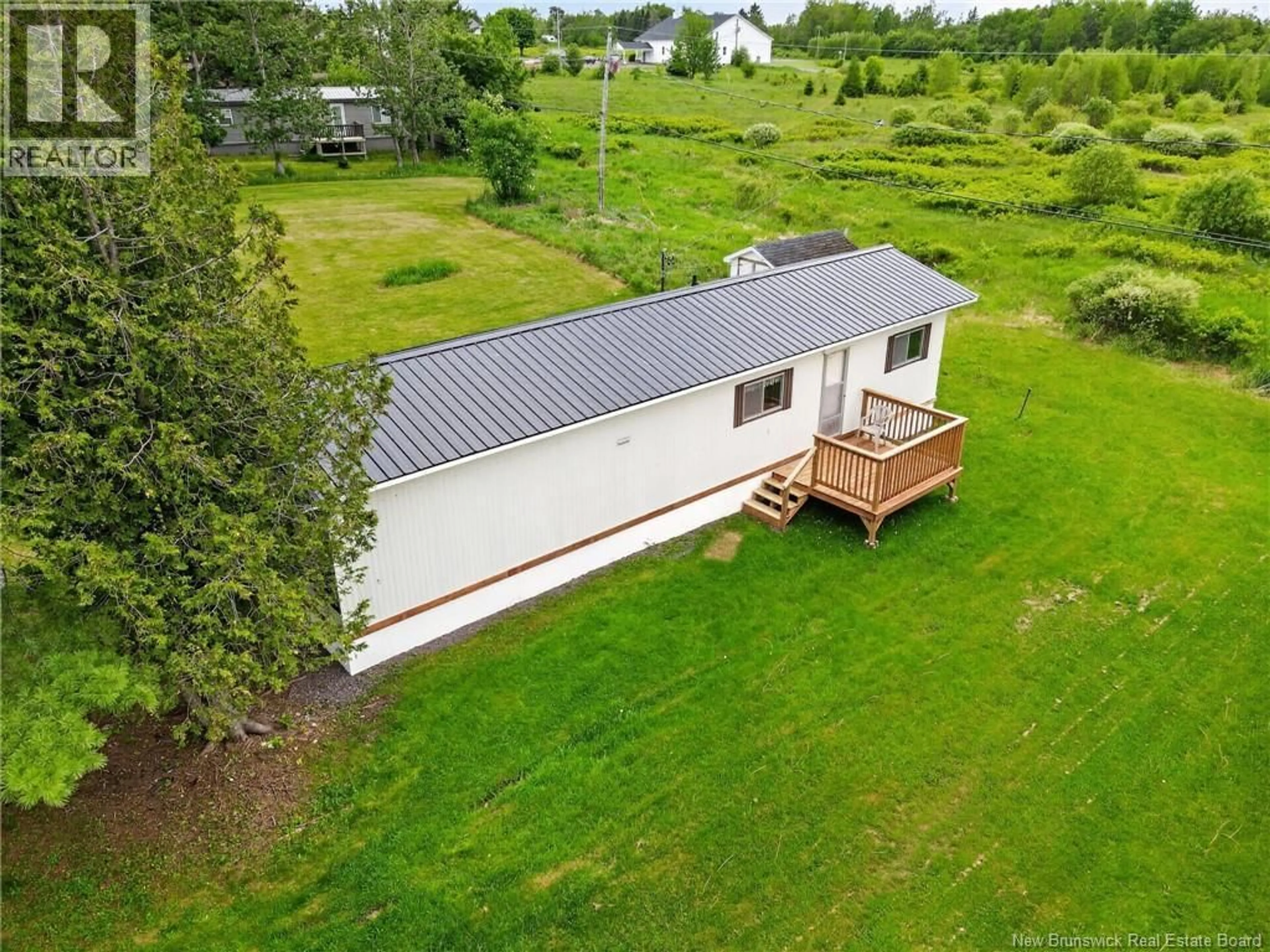 A pic from outside/outdoor area/front of a property/back of a property/a pic from drone, unknown for 14 RAWORTH AVENUE, Lakeville New Brunswick E1H1J5