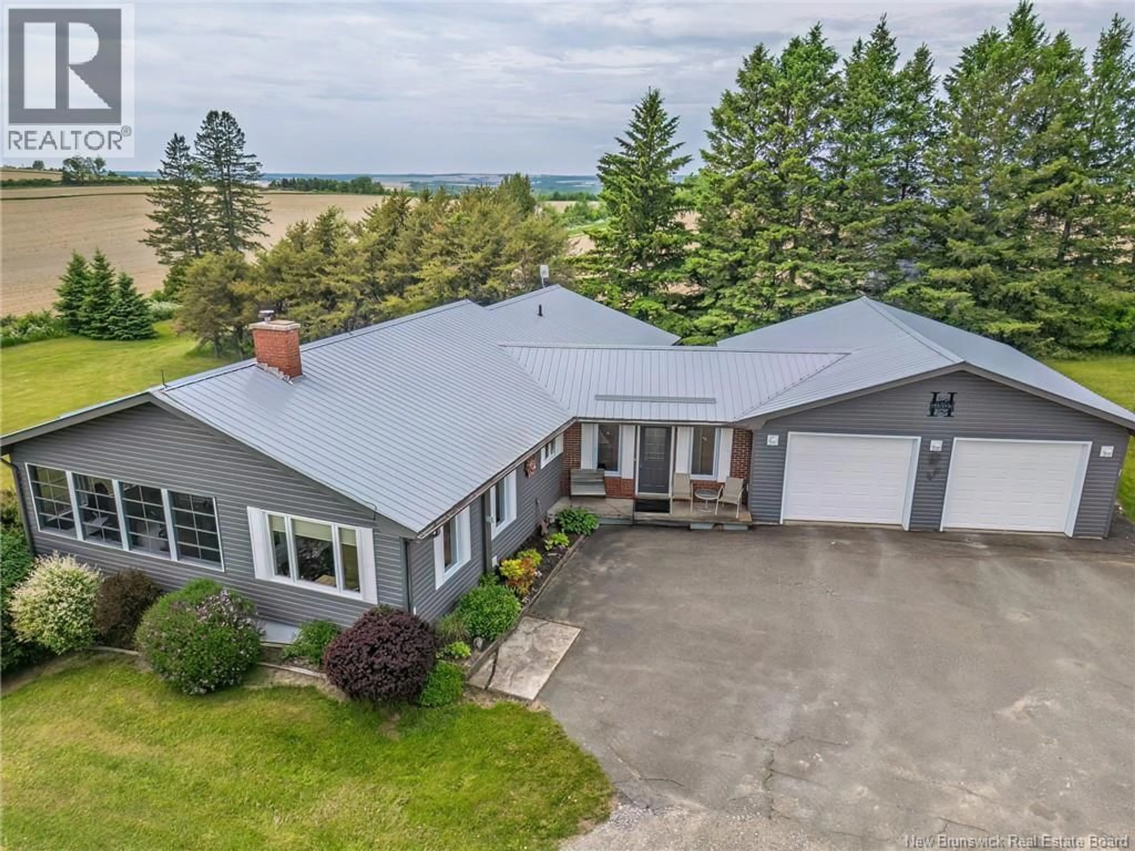 A pic from outside/outdoor area/front of a property/back of a property/a pic from drone, unknown for 31 MAIN NEW DENMARK ROAD, New Denmark New Brunswick E7G2C1