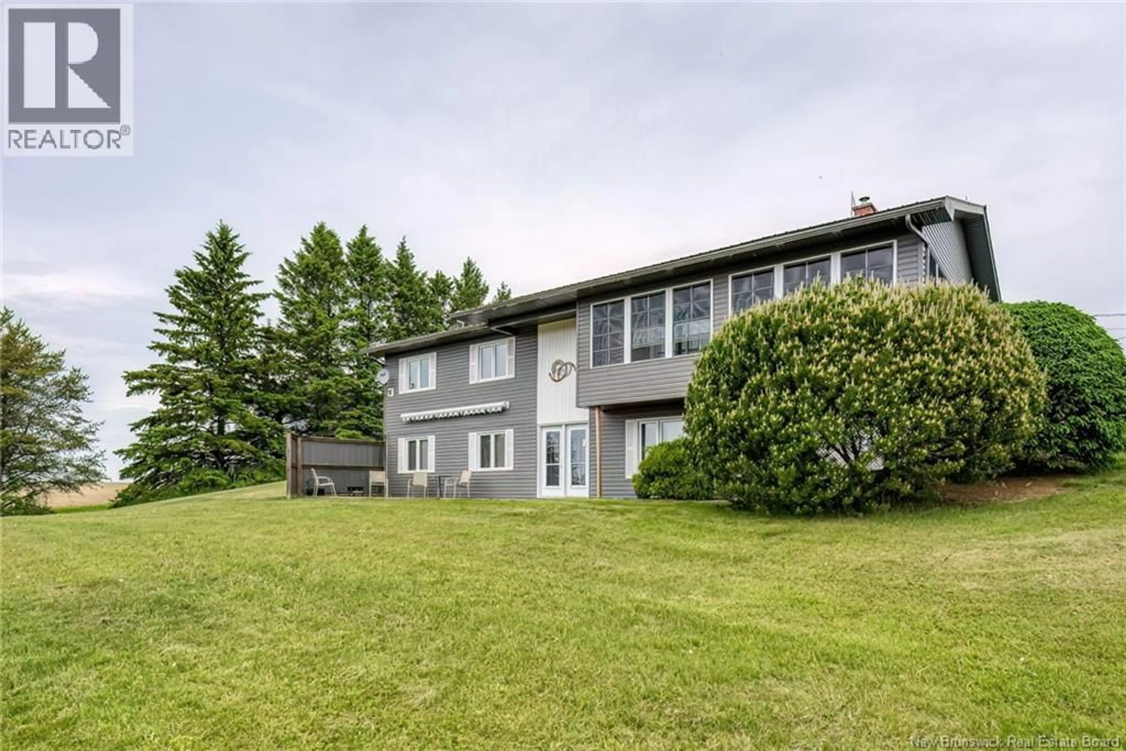 A pic from outside/outdoor area/front of a property/back of a property/a pic from drone, unknown for 31 MAIN NEW DENMARK ROAD, New Denmark New Brunswick E7G2C1