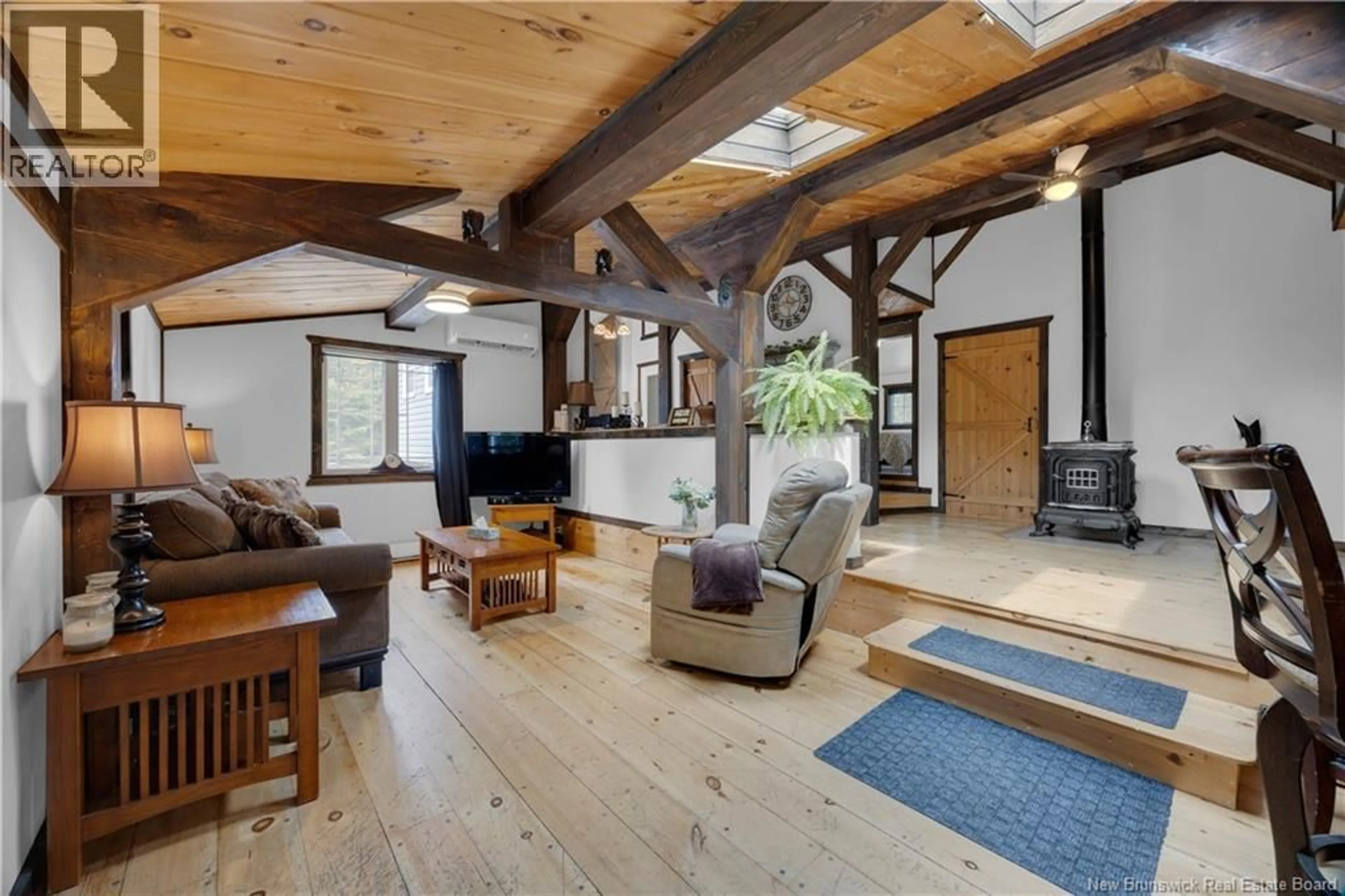 Living room with furniture, wood/laminate floor for 165 BASE ROAD, Willow Grove New Brunswick E2S1N4